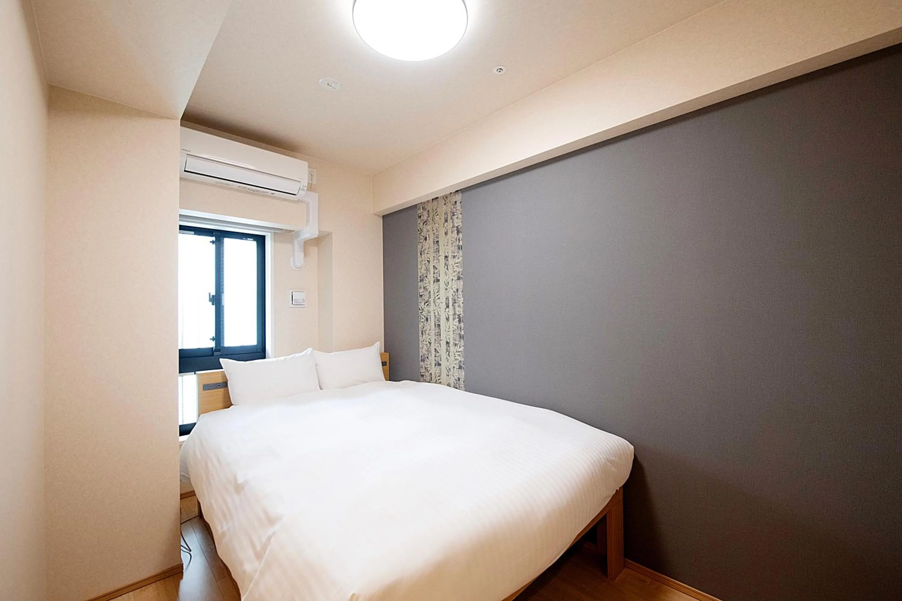 Bed in THE RISE Osaka Universal Bayside