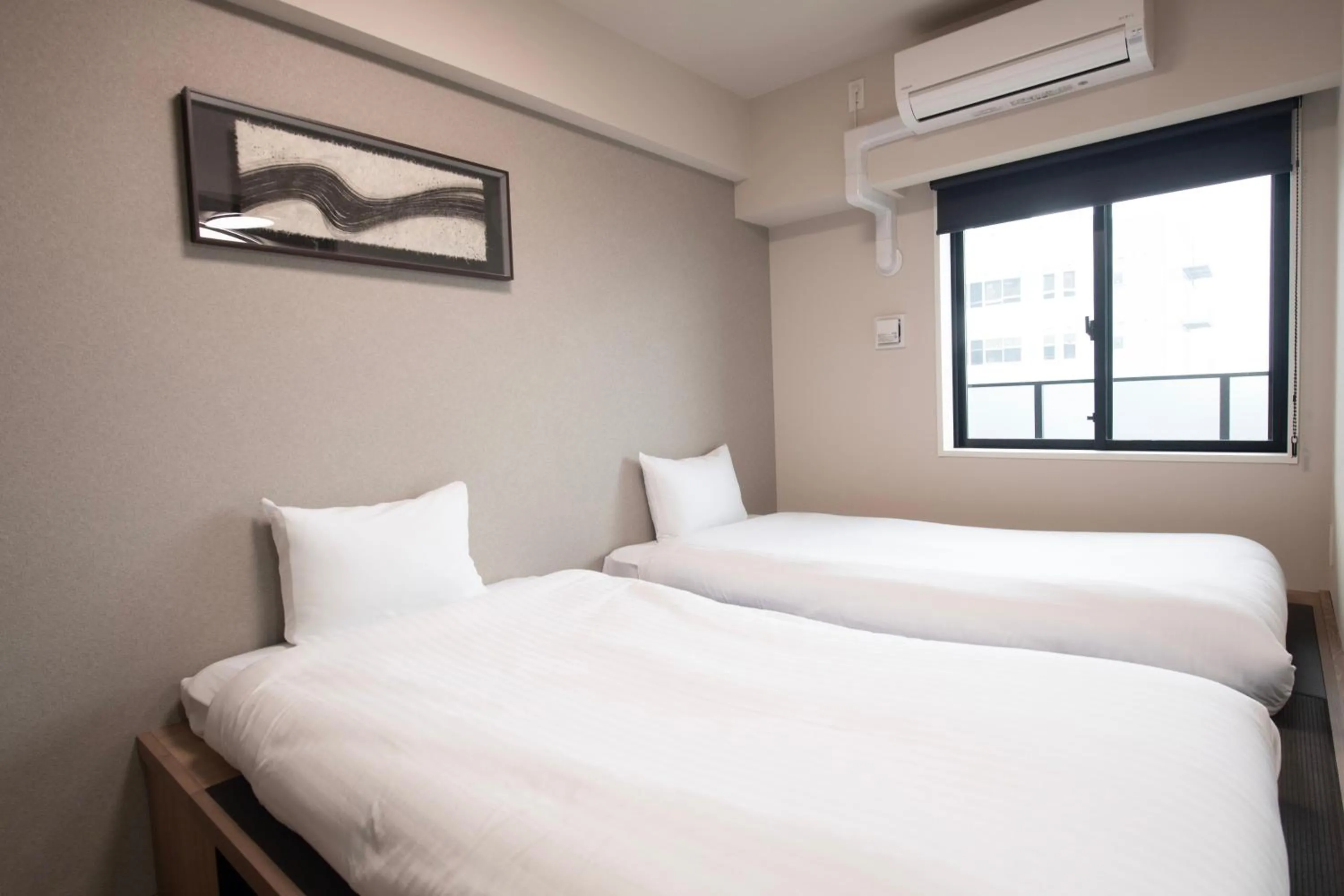 Bed in THE RISE Osaka Universal Bayside