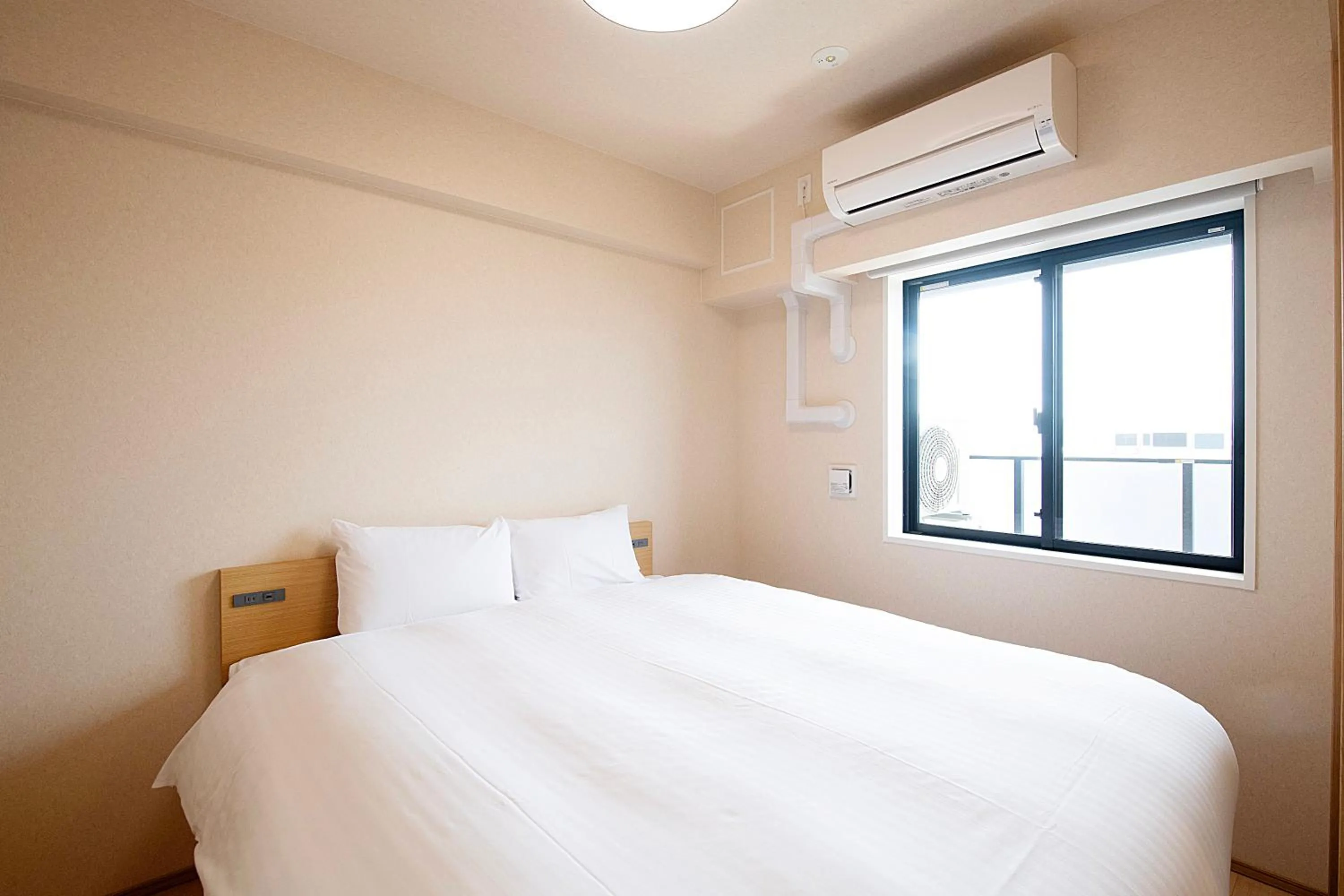 Bed in THE RISE Osaka Universal Bayside