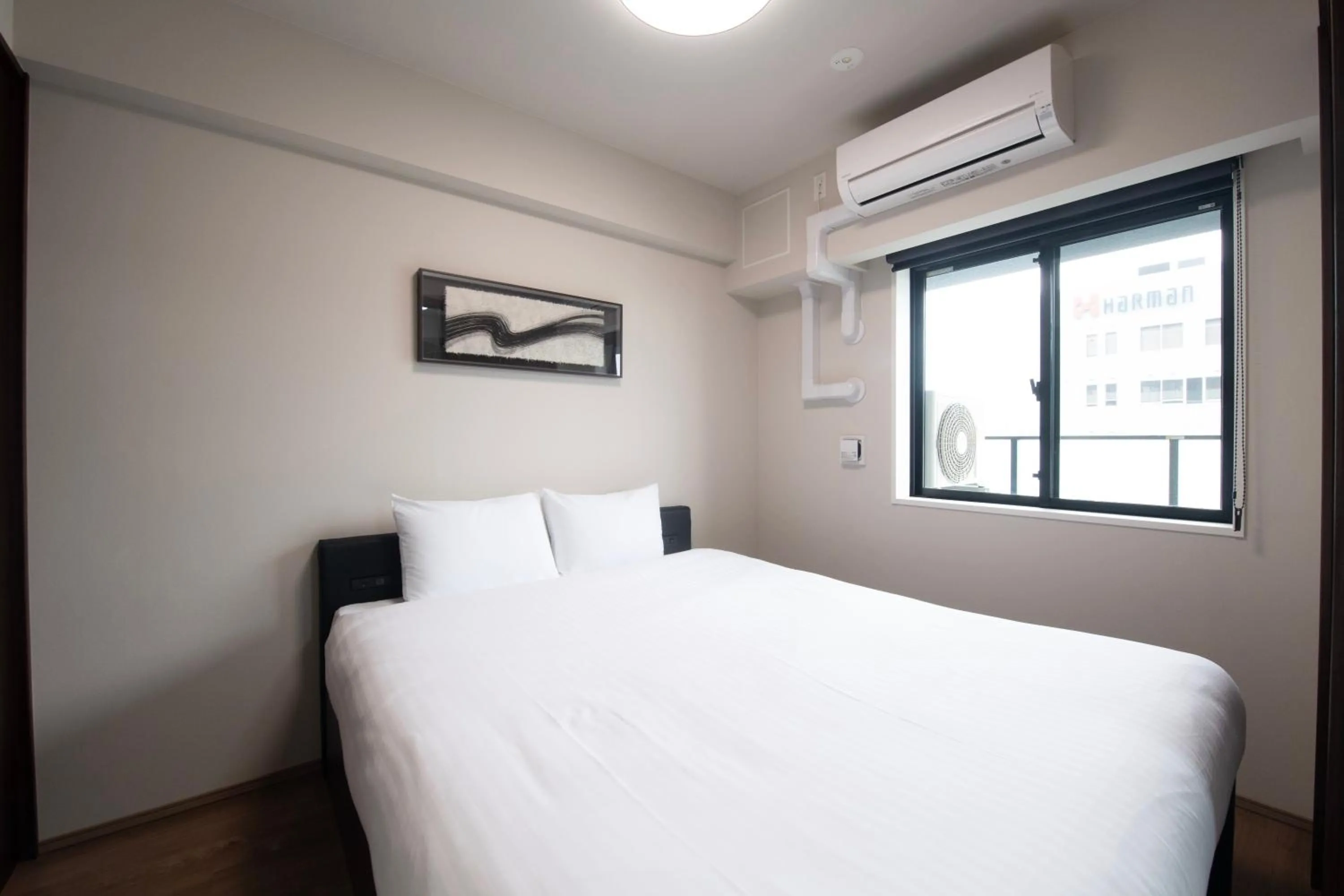 Bed in THE RISE Osaka Universal Bayside