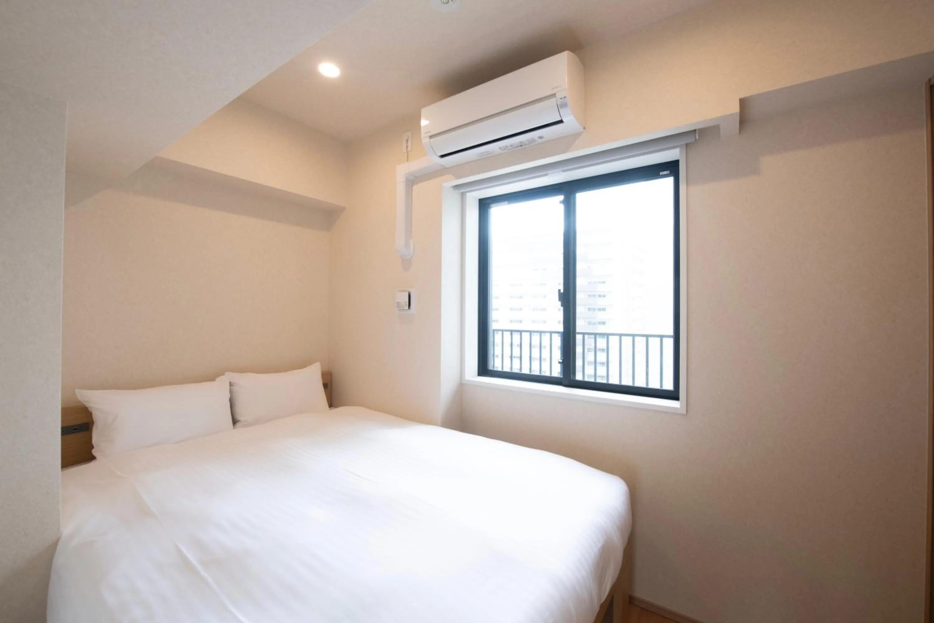 Bed in THE RISE Osaka Universal Bayside