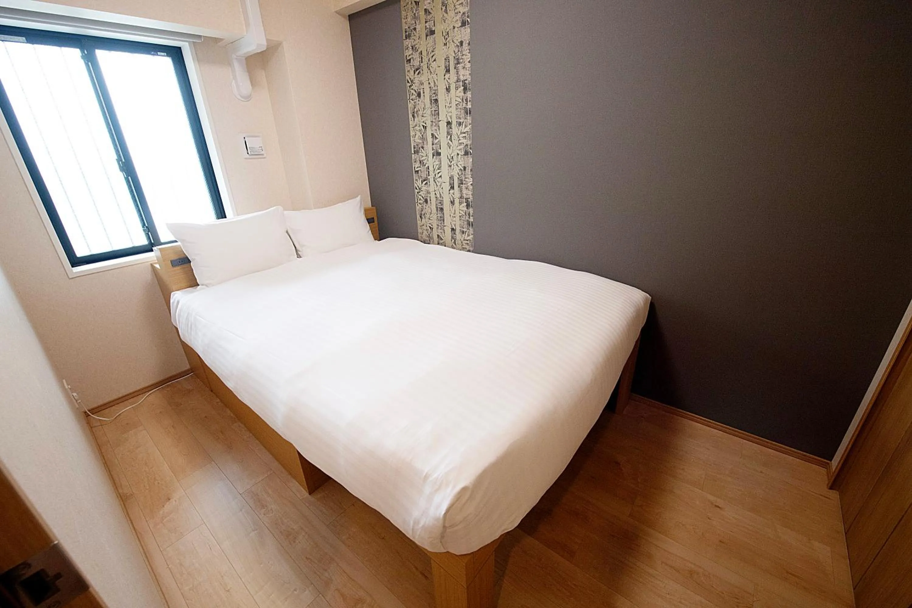 Bed in THE RISE Osaka Universal Bayside