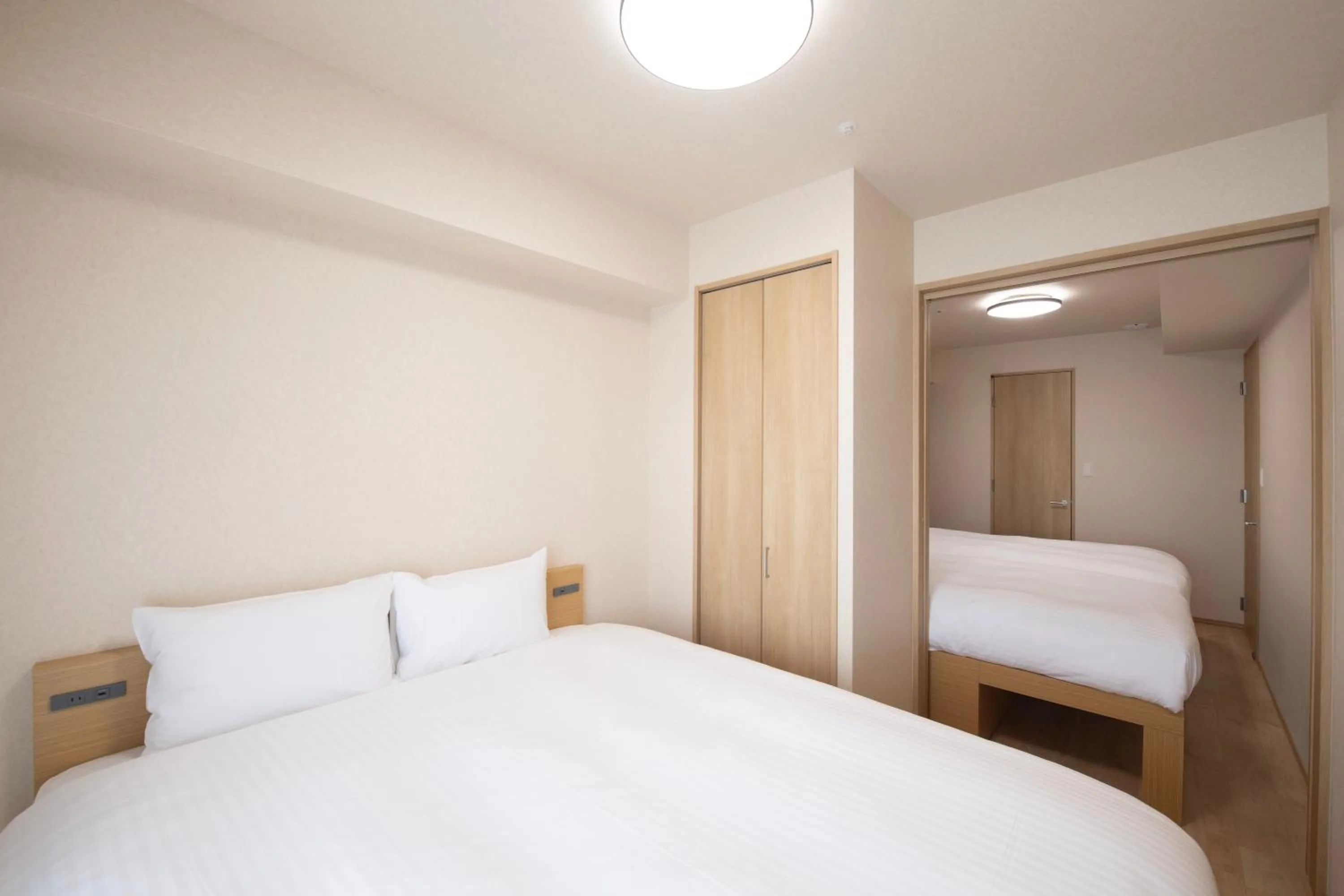 Bed in THE RISE Osaka Universal Bayside