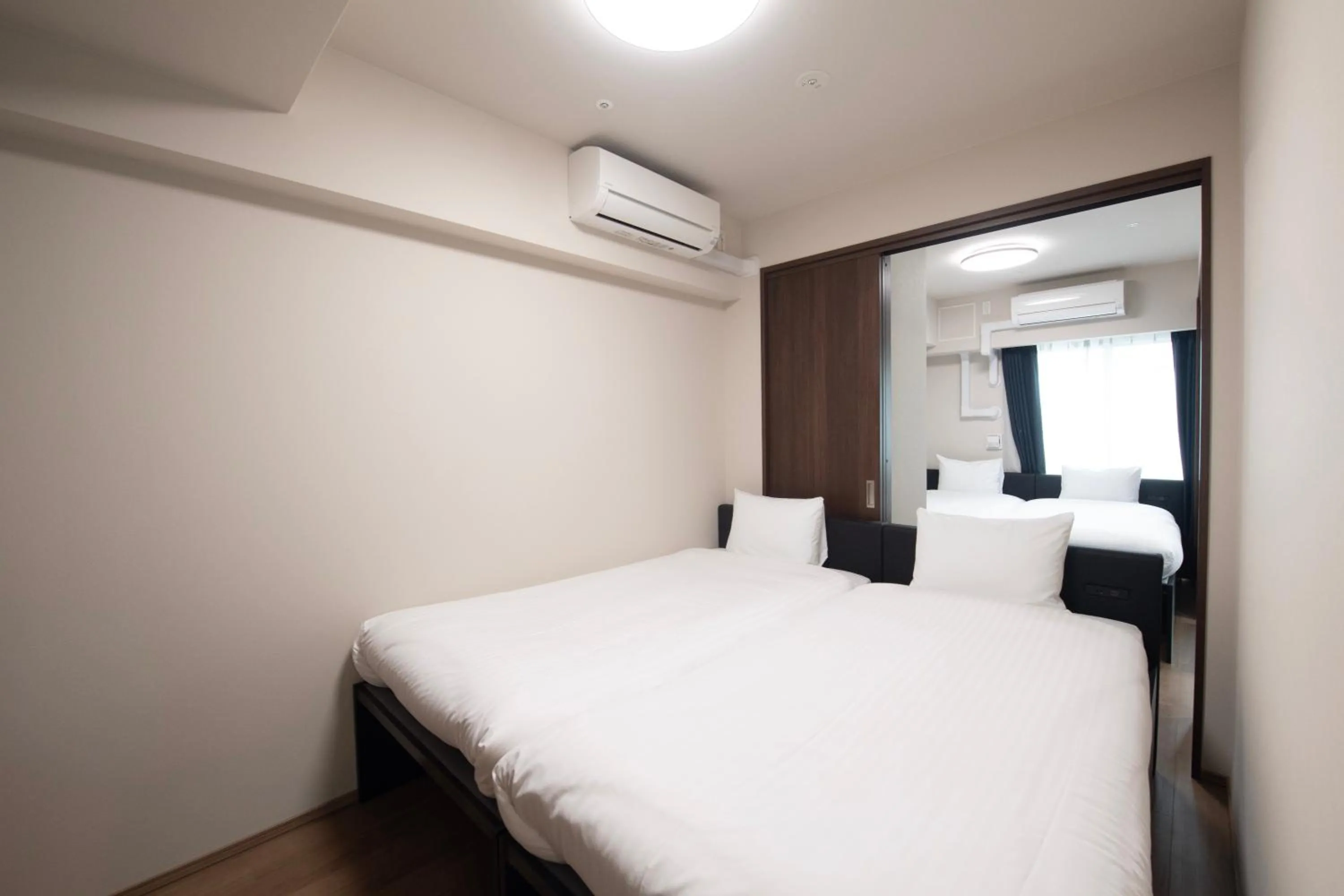 Bed in THE RISE Osaka Universal Bayside