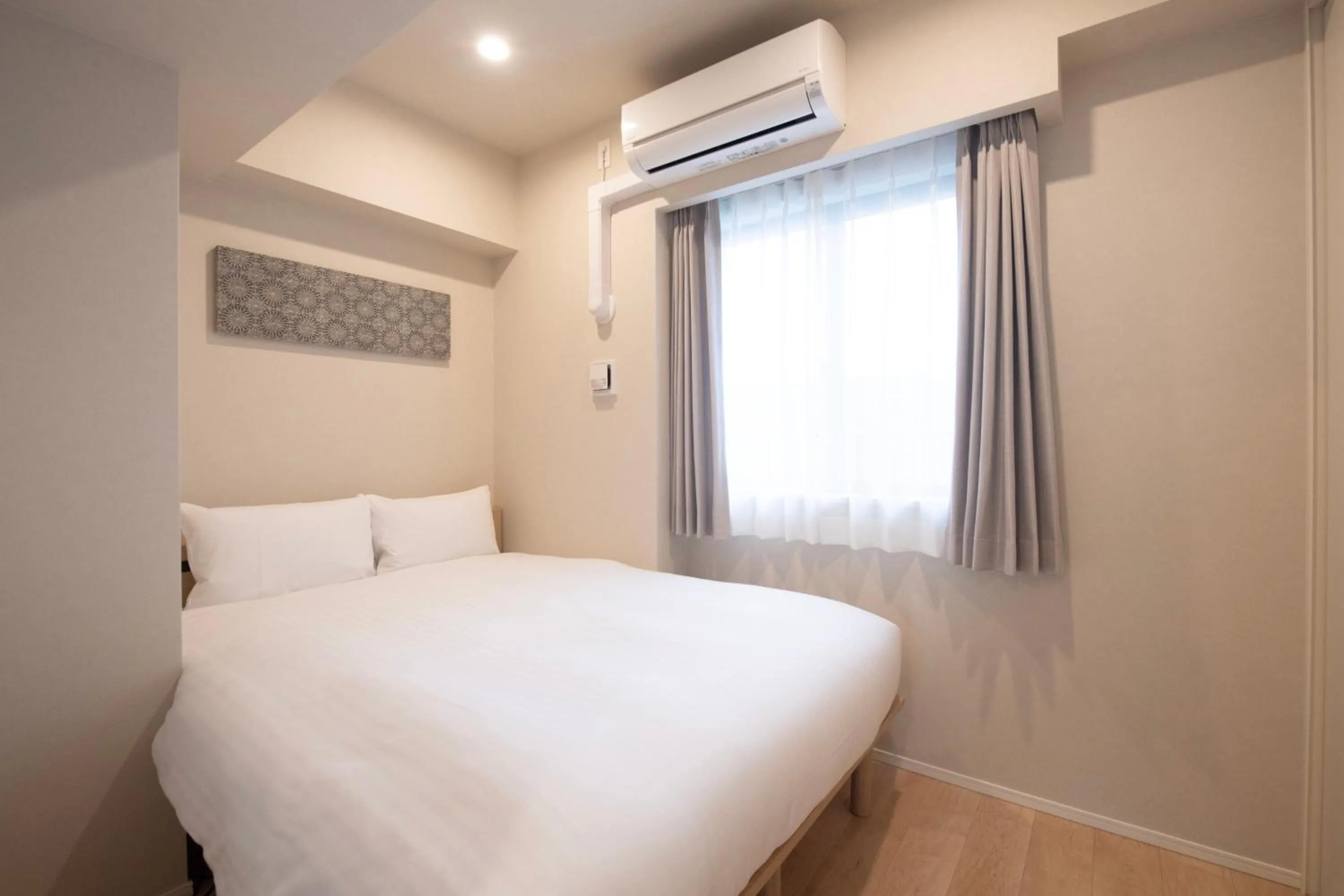 Bed in THE RISE Osaka Universal Bayside