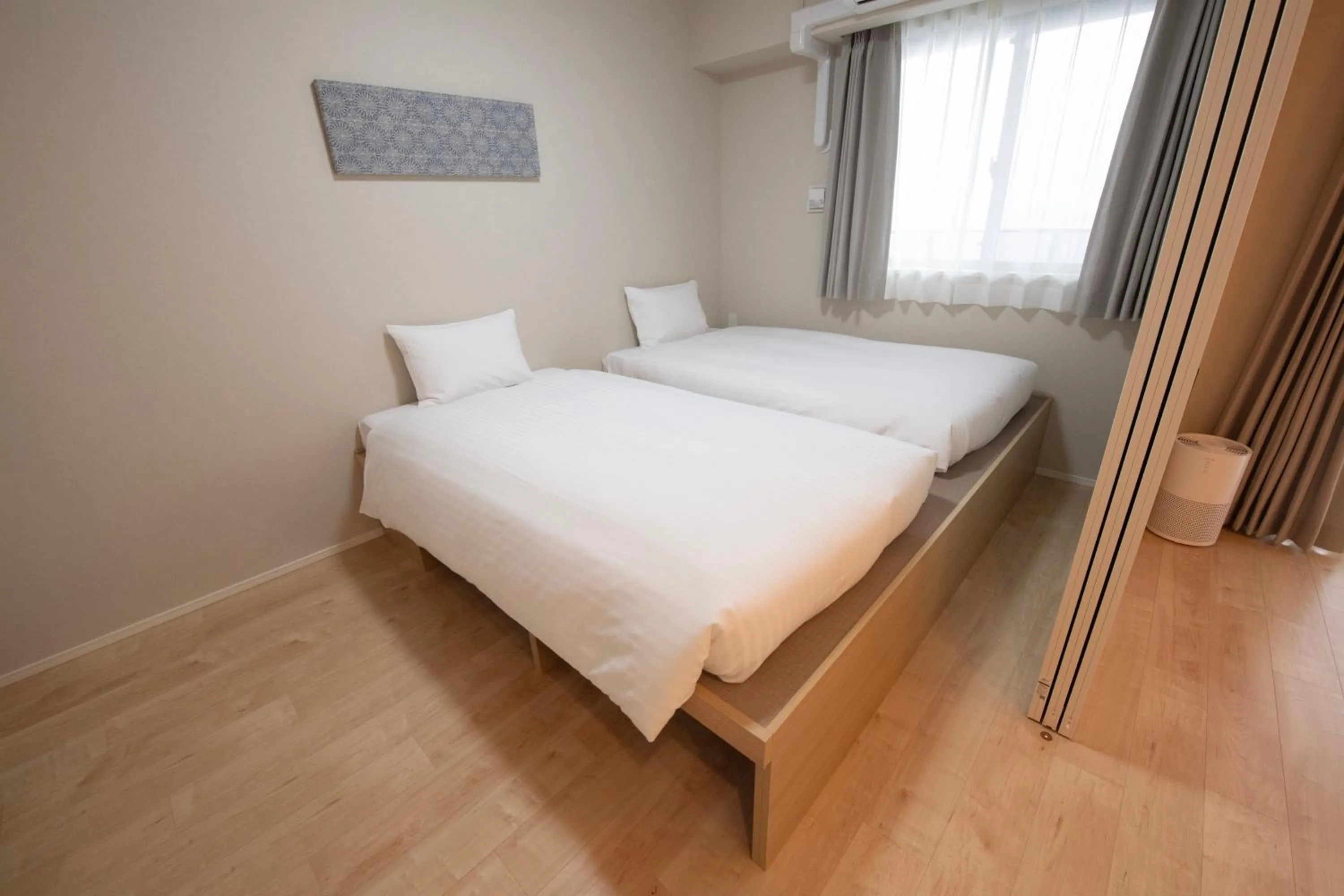 Bed in THE RISE Osaka Universal Bayside