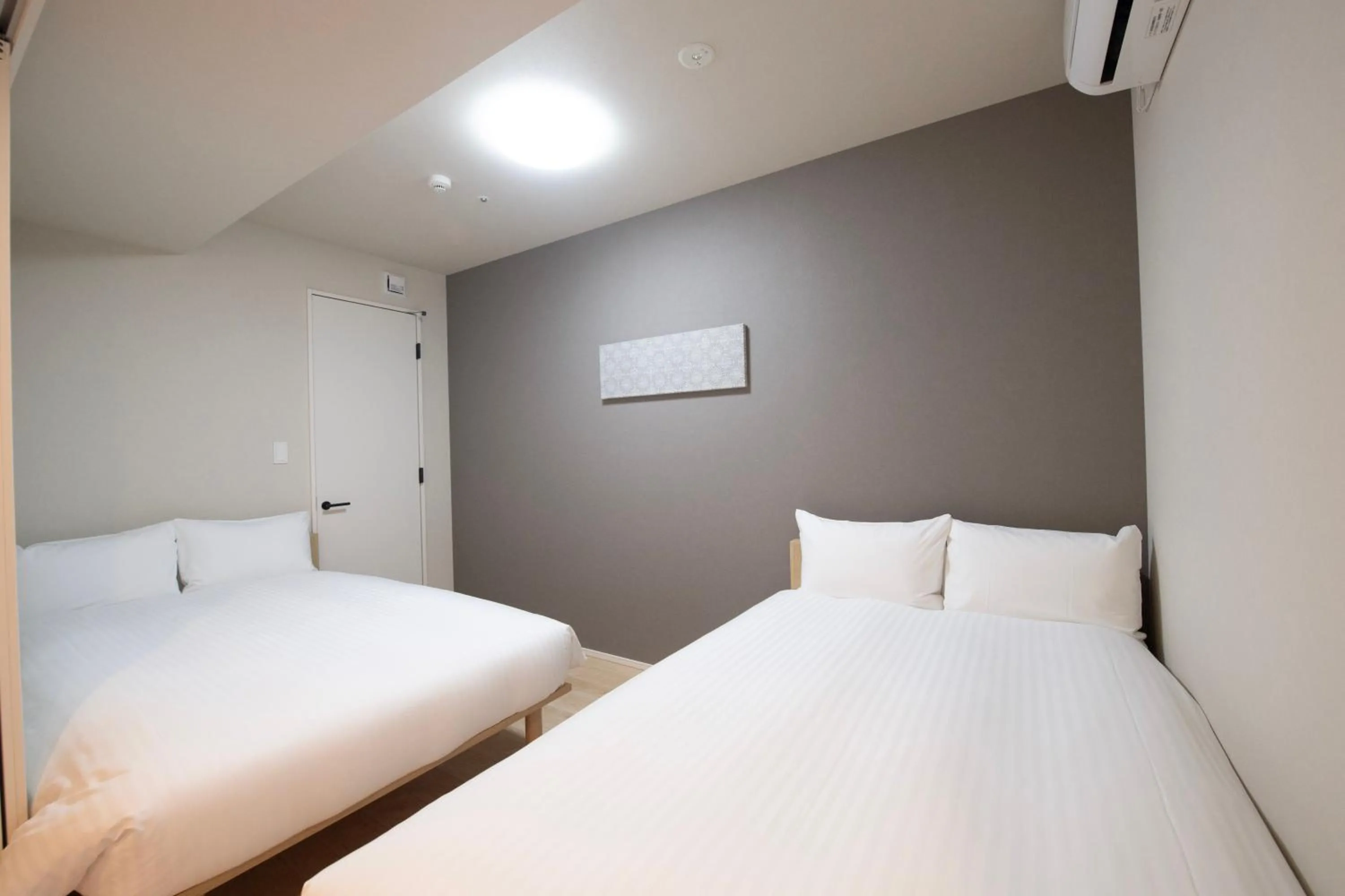 Bed in THE RISE Osaka Universal Bayside