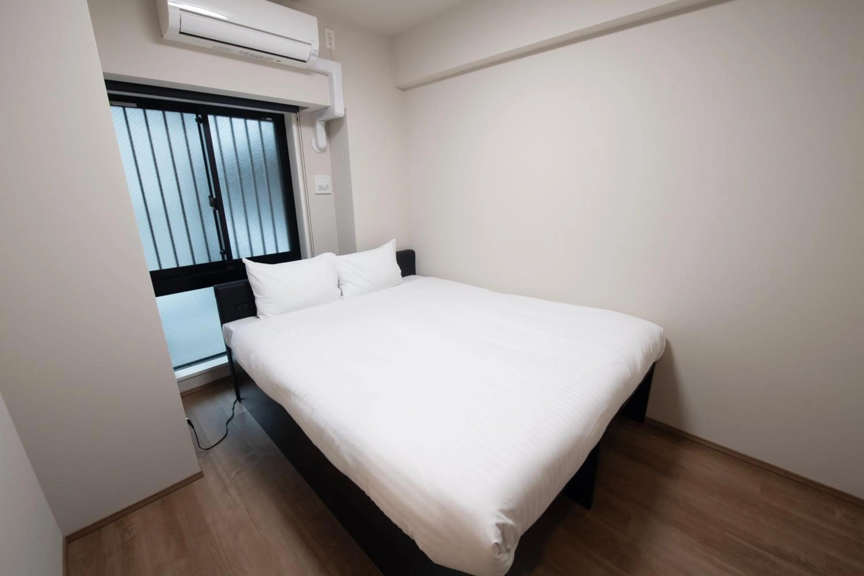 Bed in THE RISE Osaka Universal Bayside