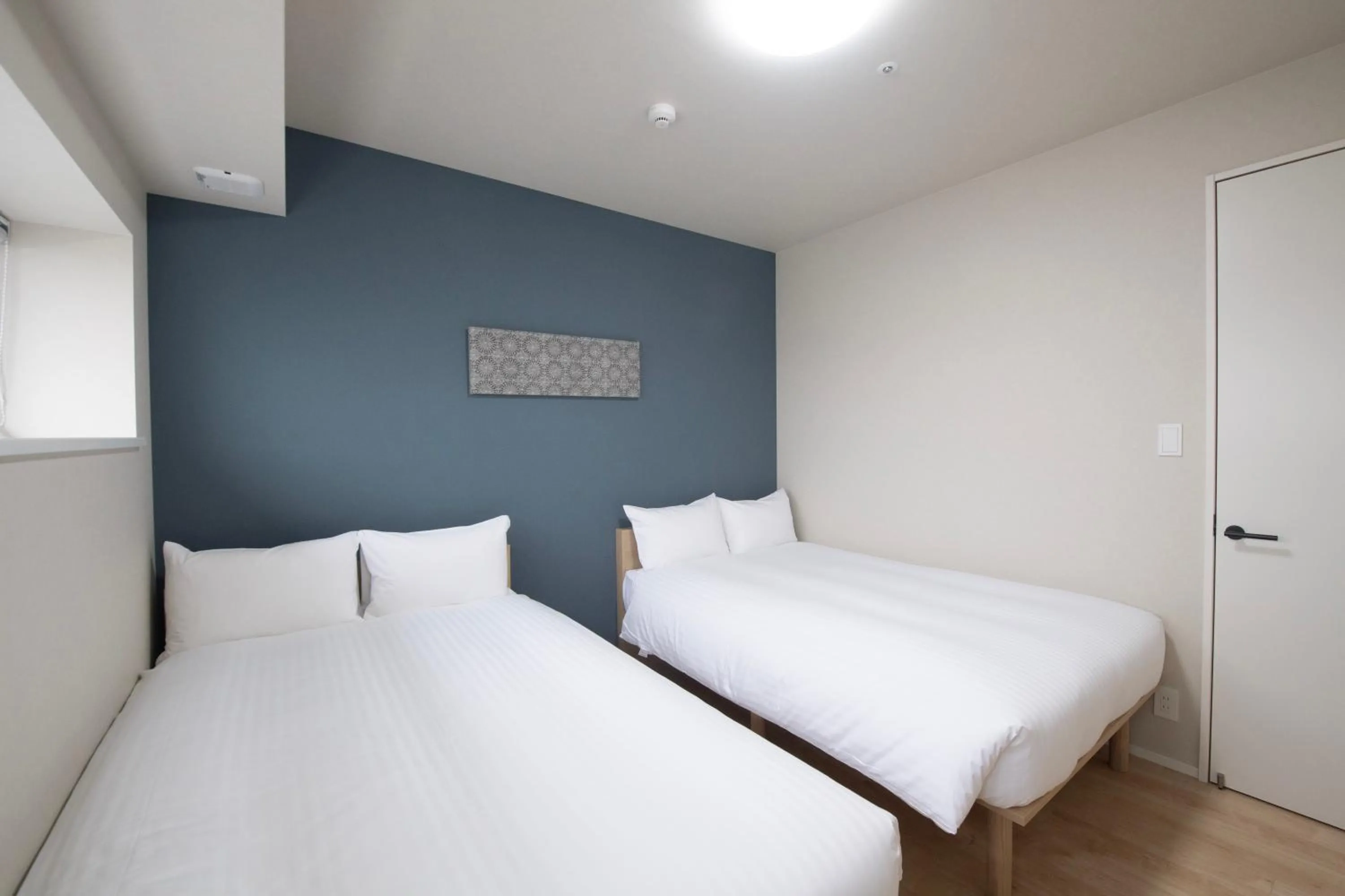 Bed in THE RISE Osaka Universal Bayside
