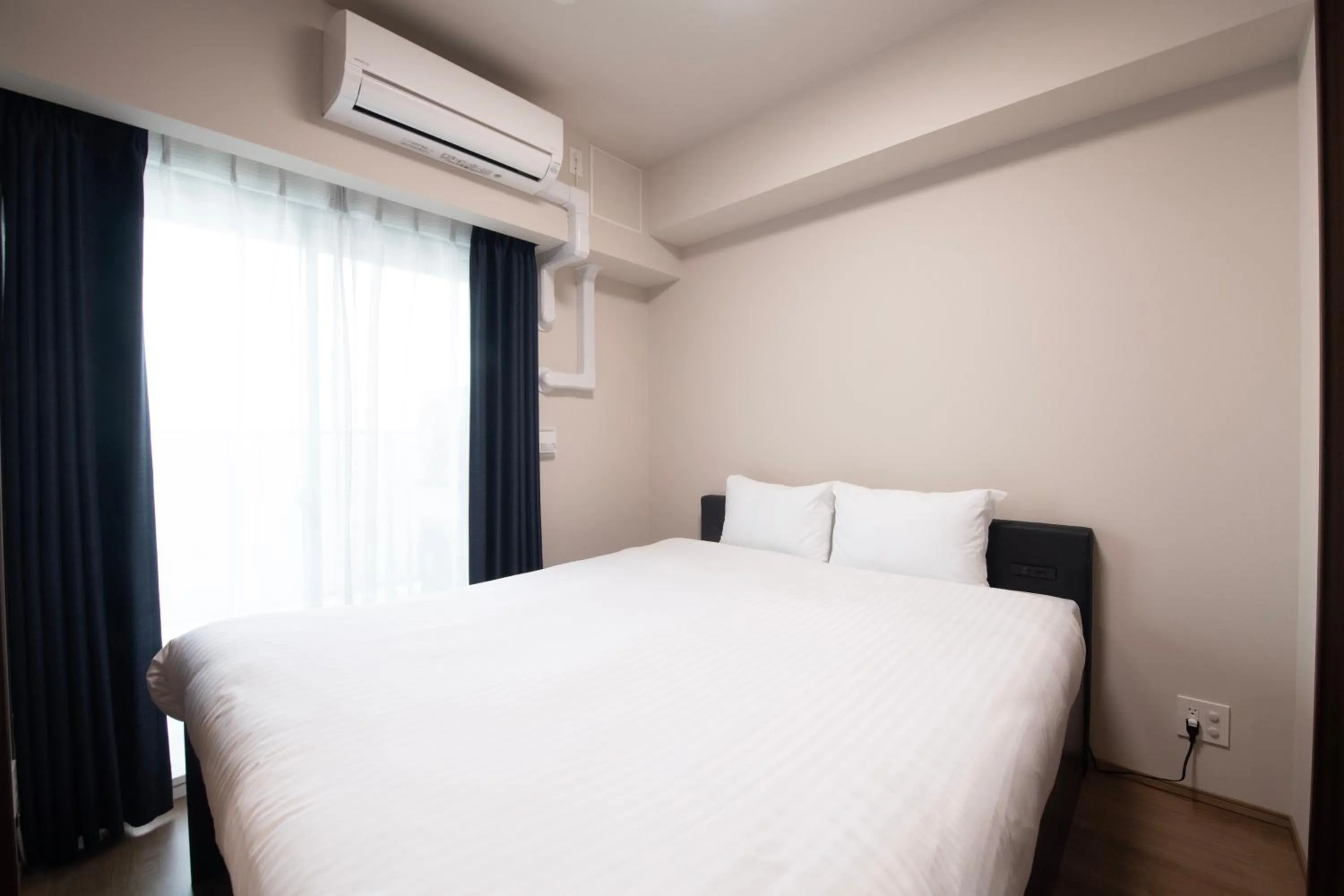 Bed in THE RISE Osaka Universal Bayside