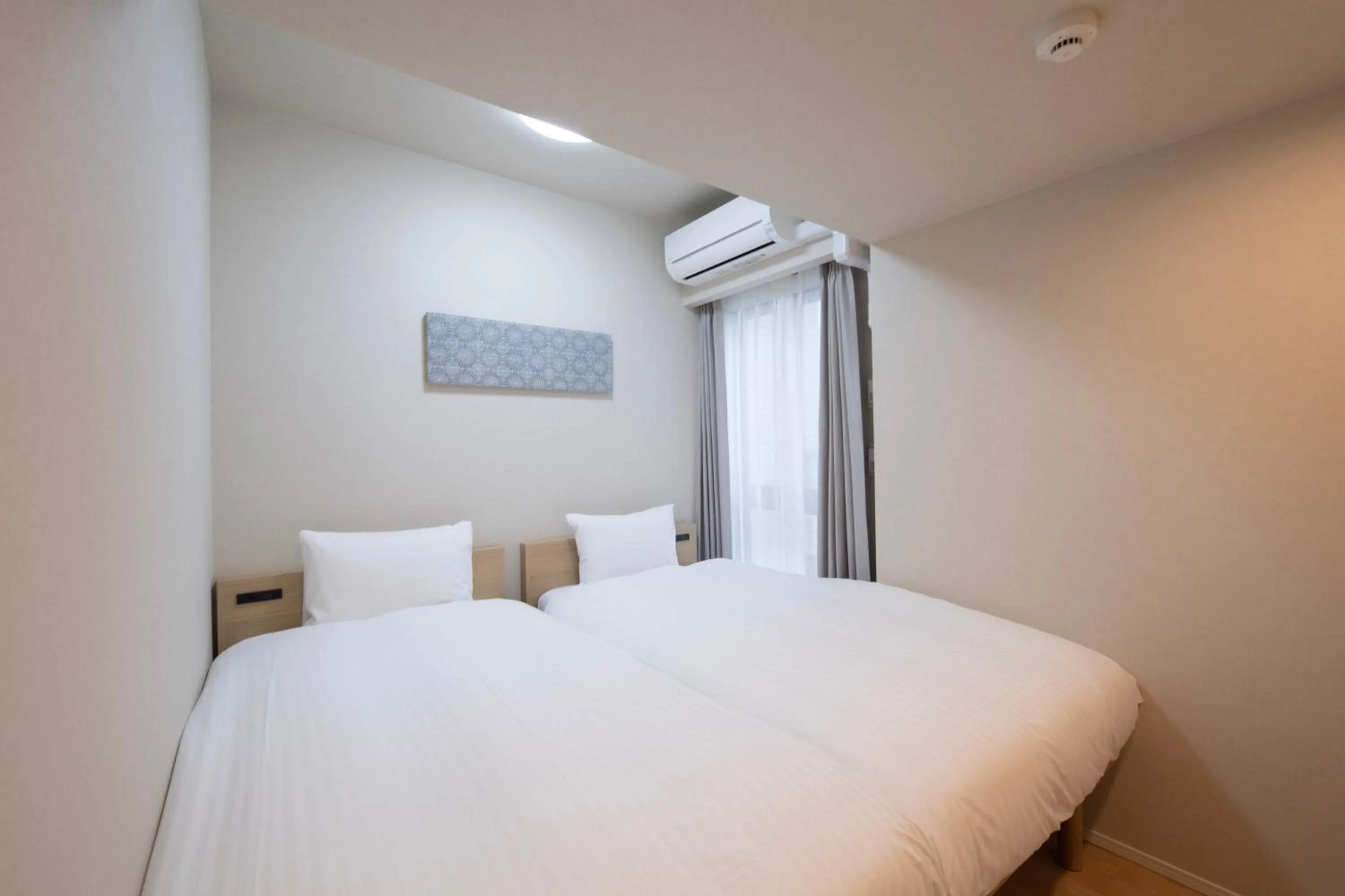 Bed in THE RISE Osaka Universal Bayside