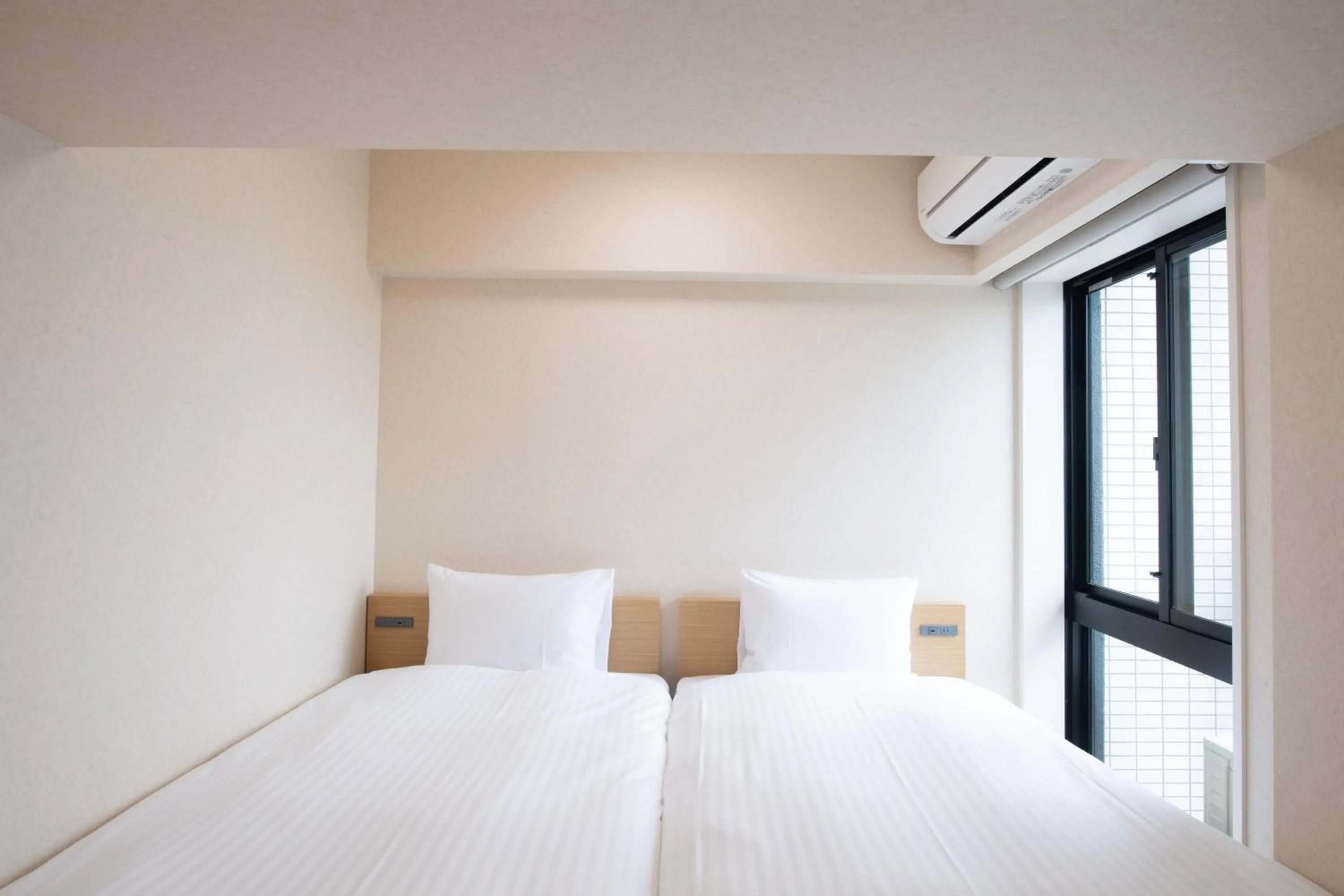 Bed in THE RISE Osaka Universal Bayside
