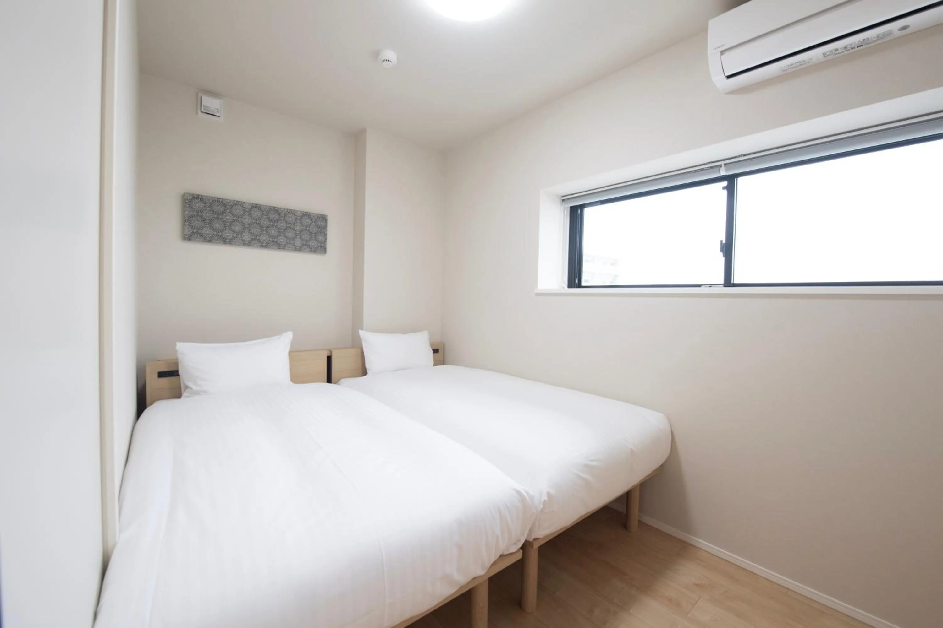 Bed in THE RISE Osaka Universal Bayside