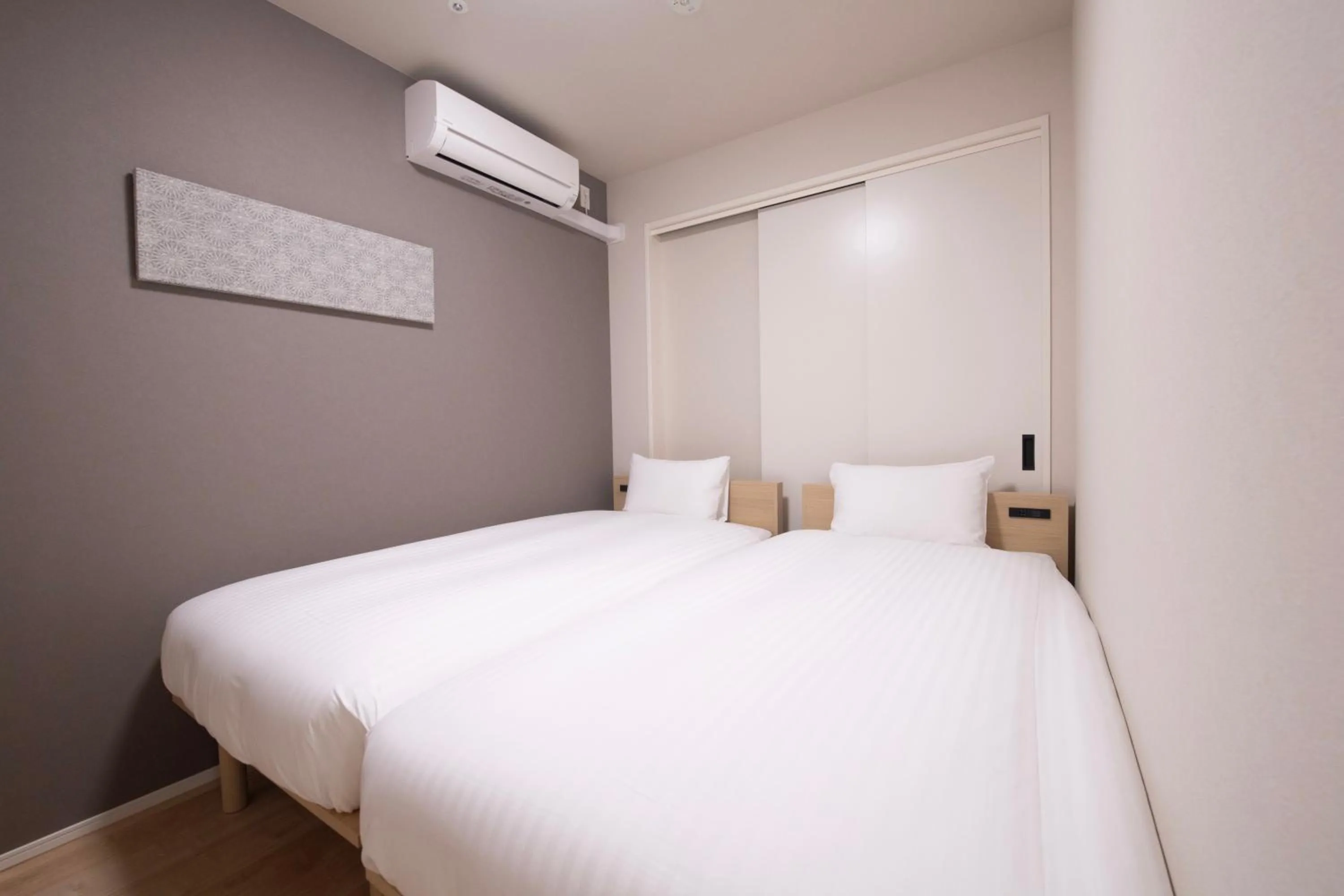 Bed in THE RISE Osaka Universal Bayside