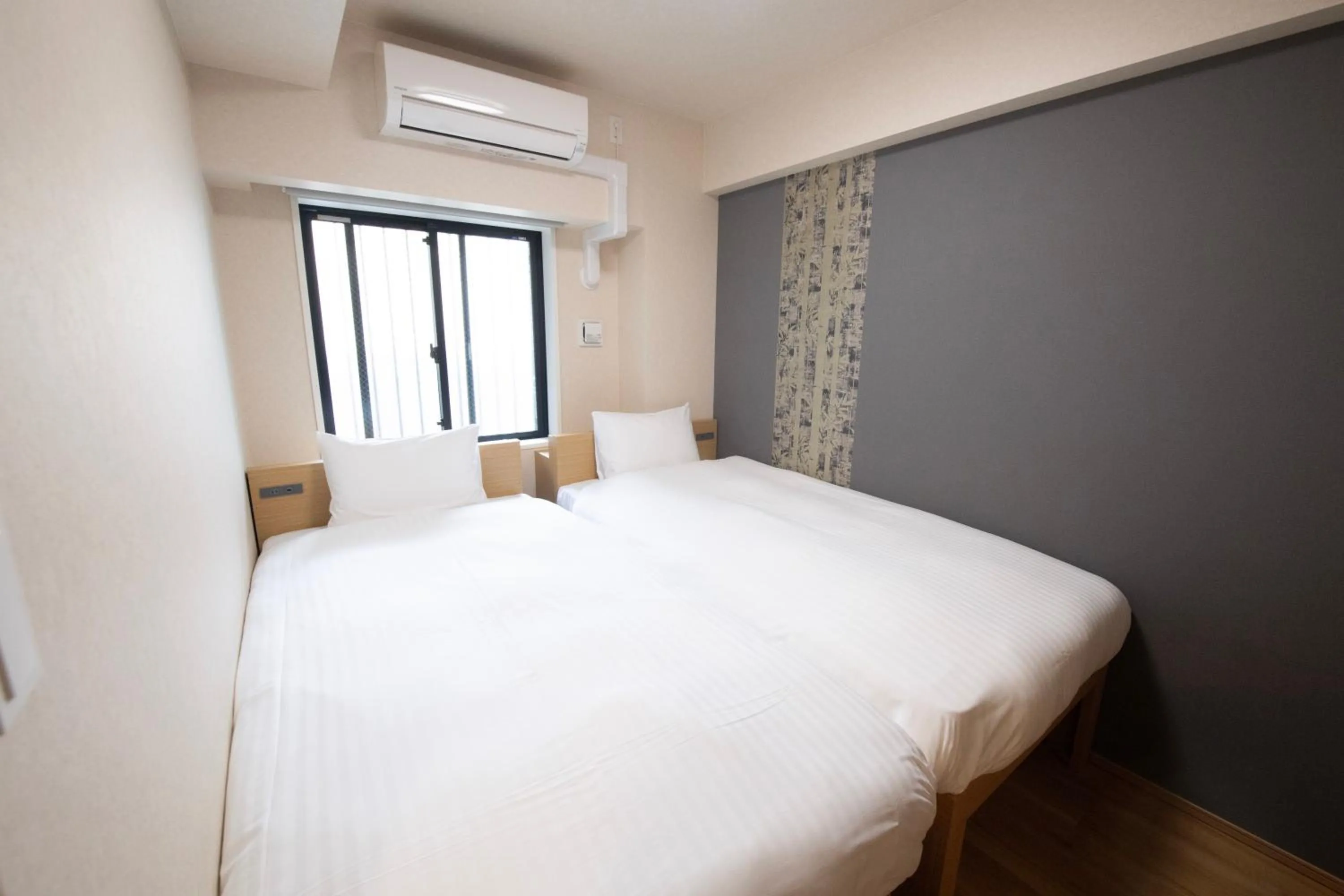 Bed in THE RISE Osaka Universal Bayside