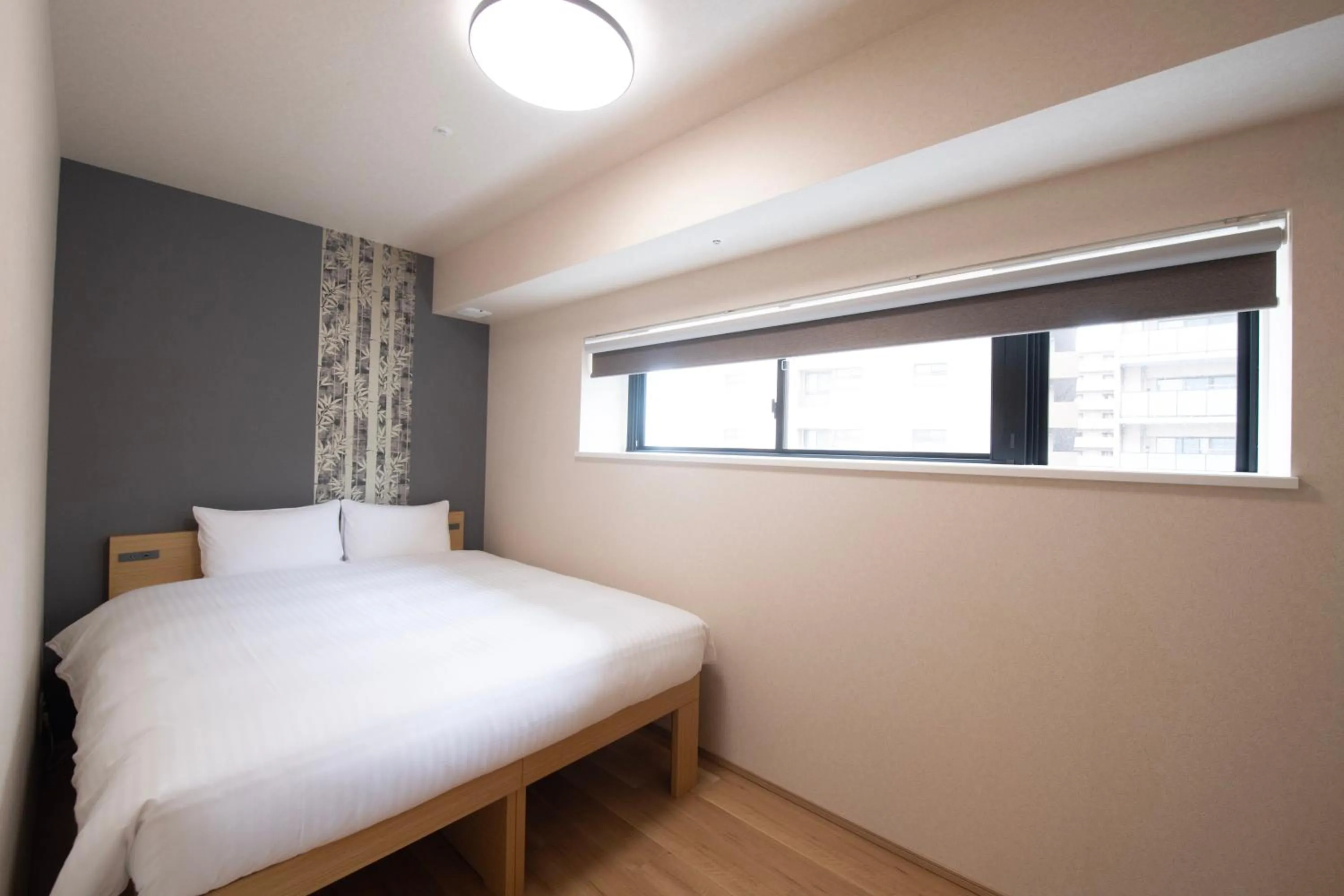 Bed in THE RISE Osaka Universal Bayside