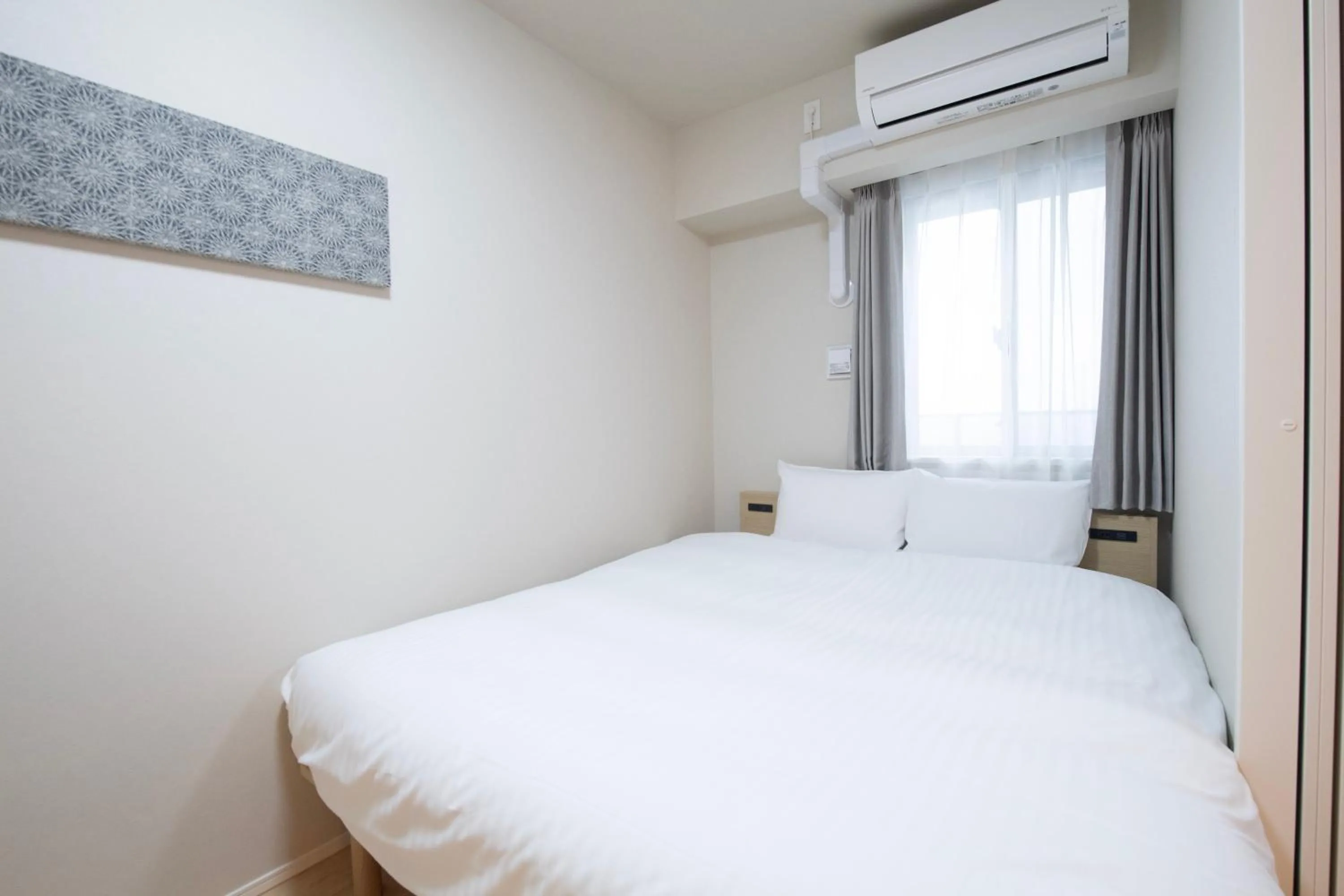 Bed in THE RISE Osaka Universal Bayside