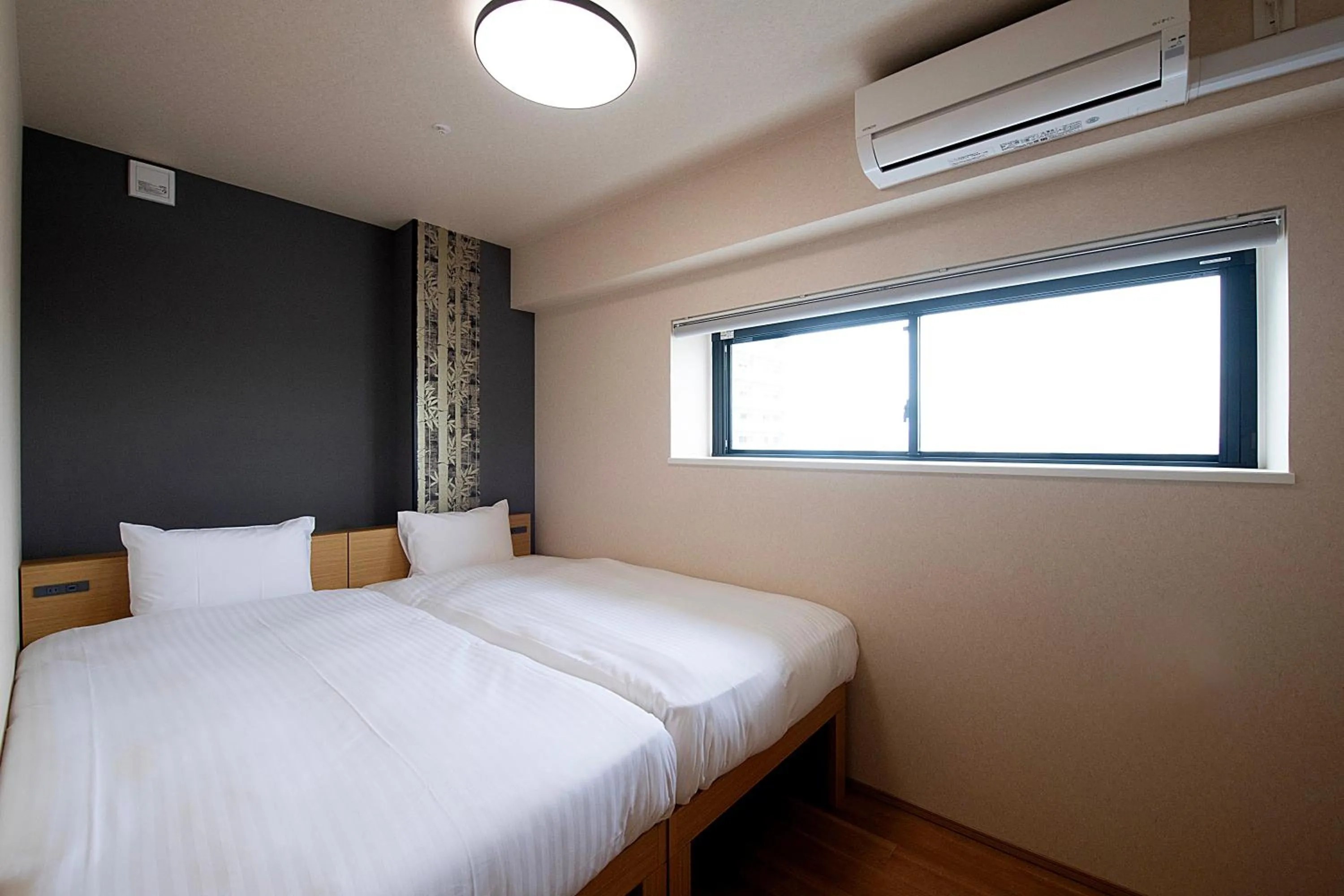 Bed in THE RISE Osaka Universal Bayside