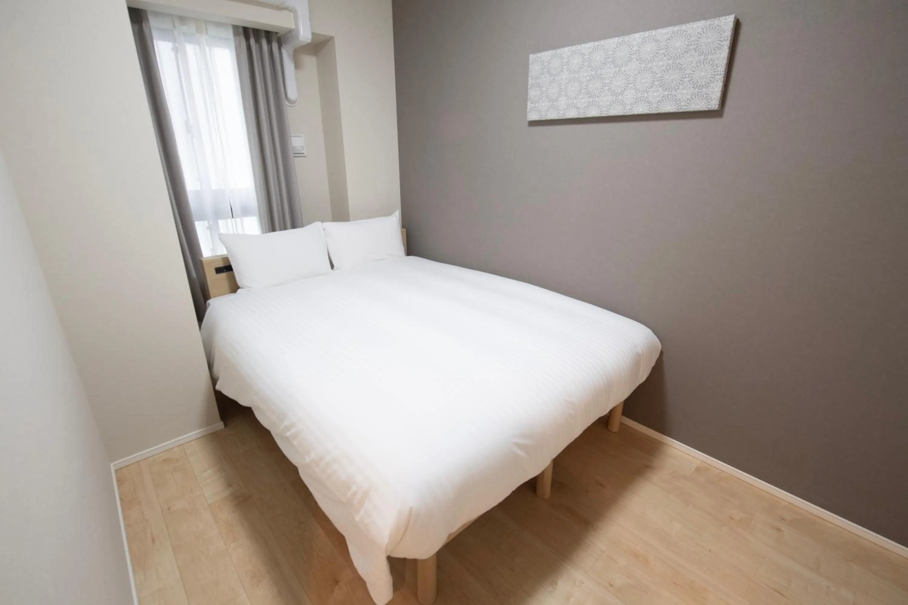 Bed in THE RISE Osaka Universal Bayside