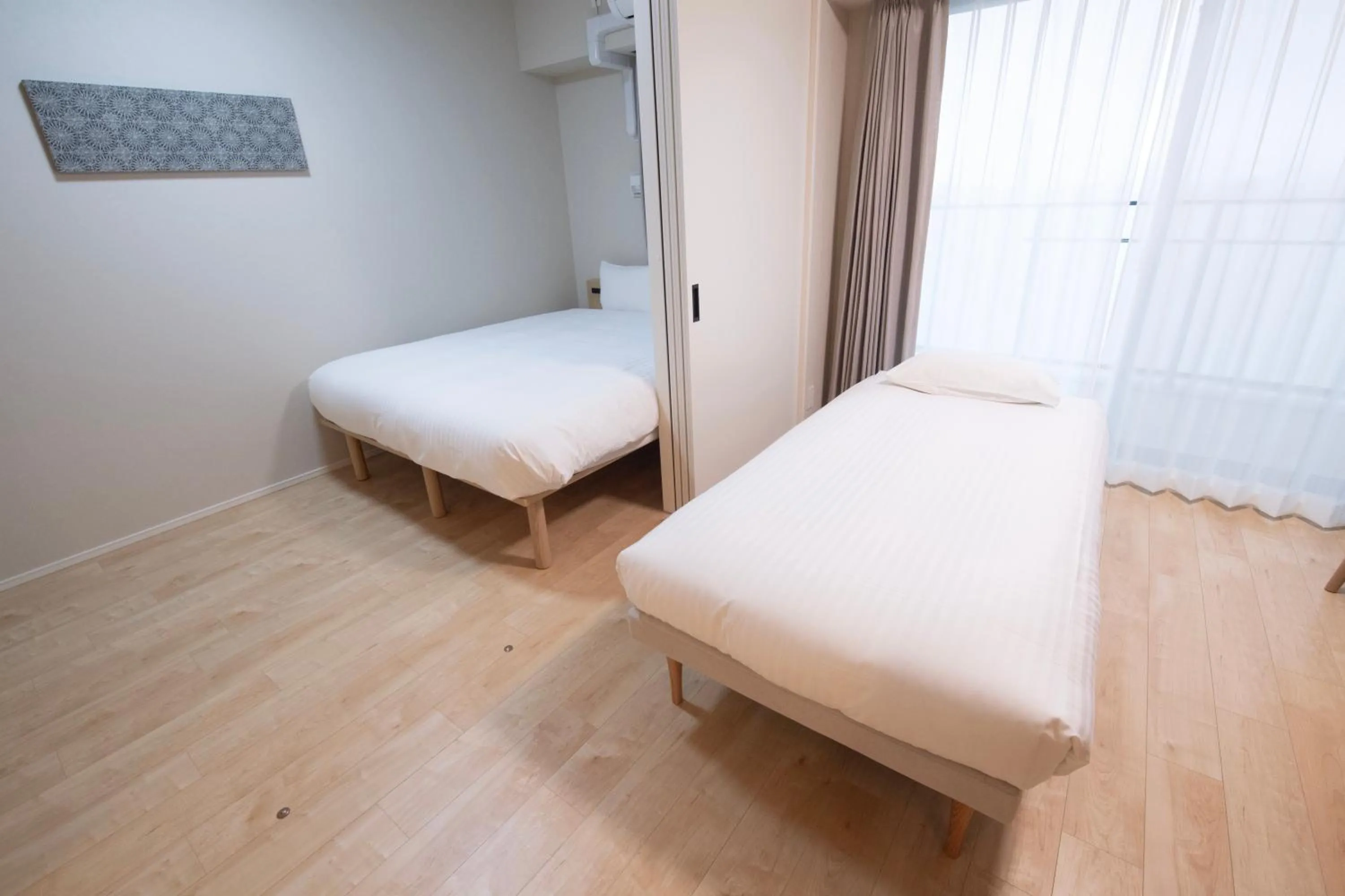 Bed in THE RISE Osaka Universal Bayside