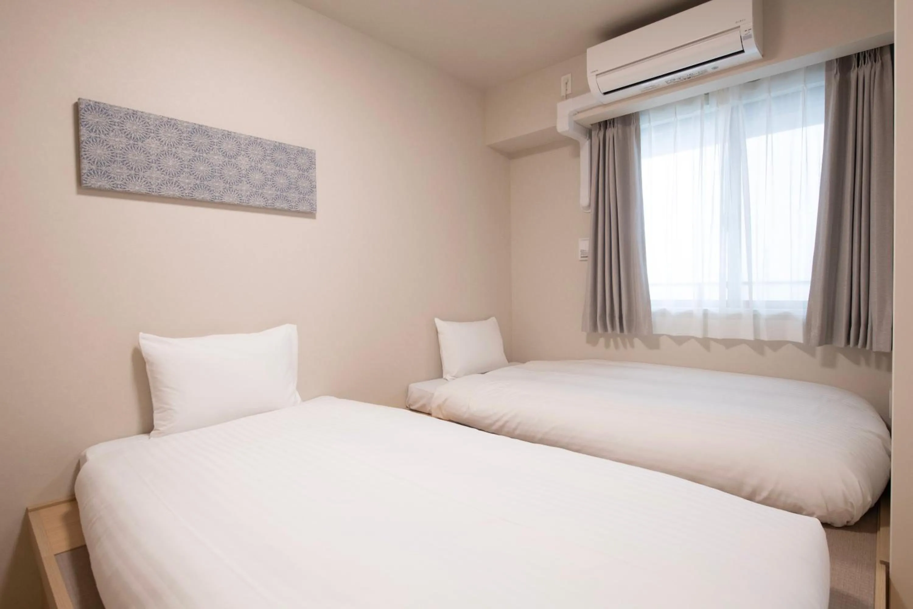 Bed in THE RISE Osaka Universal Bayside