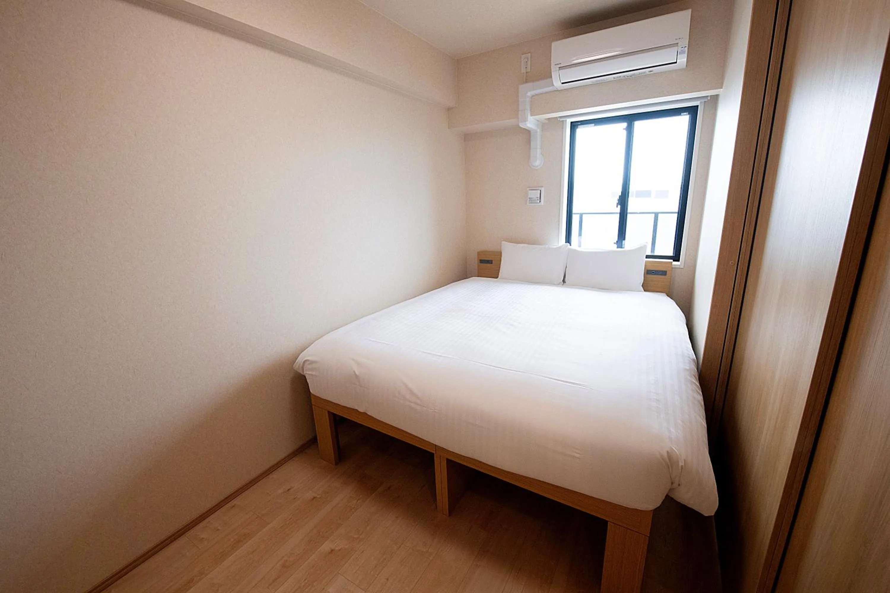 Bed in THE RISE Osaka Universal Bayside