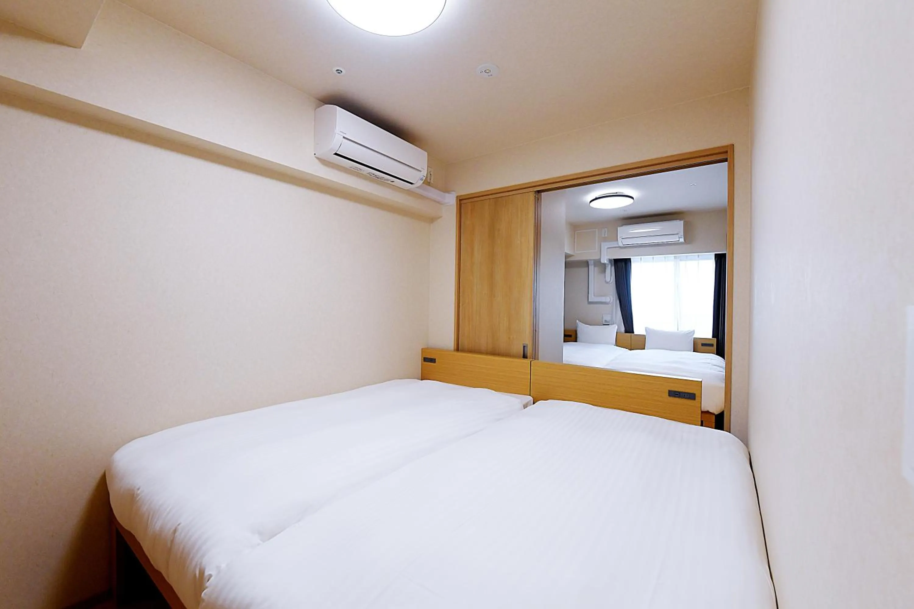 Bed in THE RISE Osaka Universal Bayside