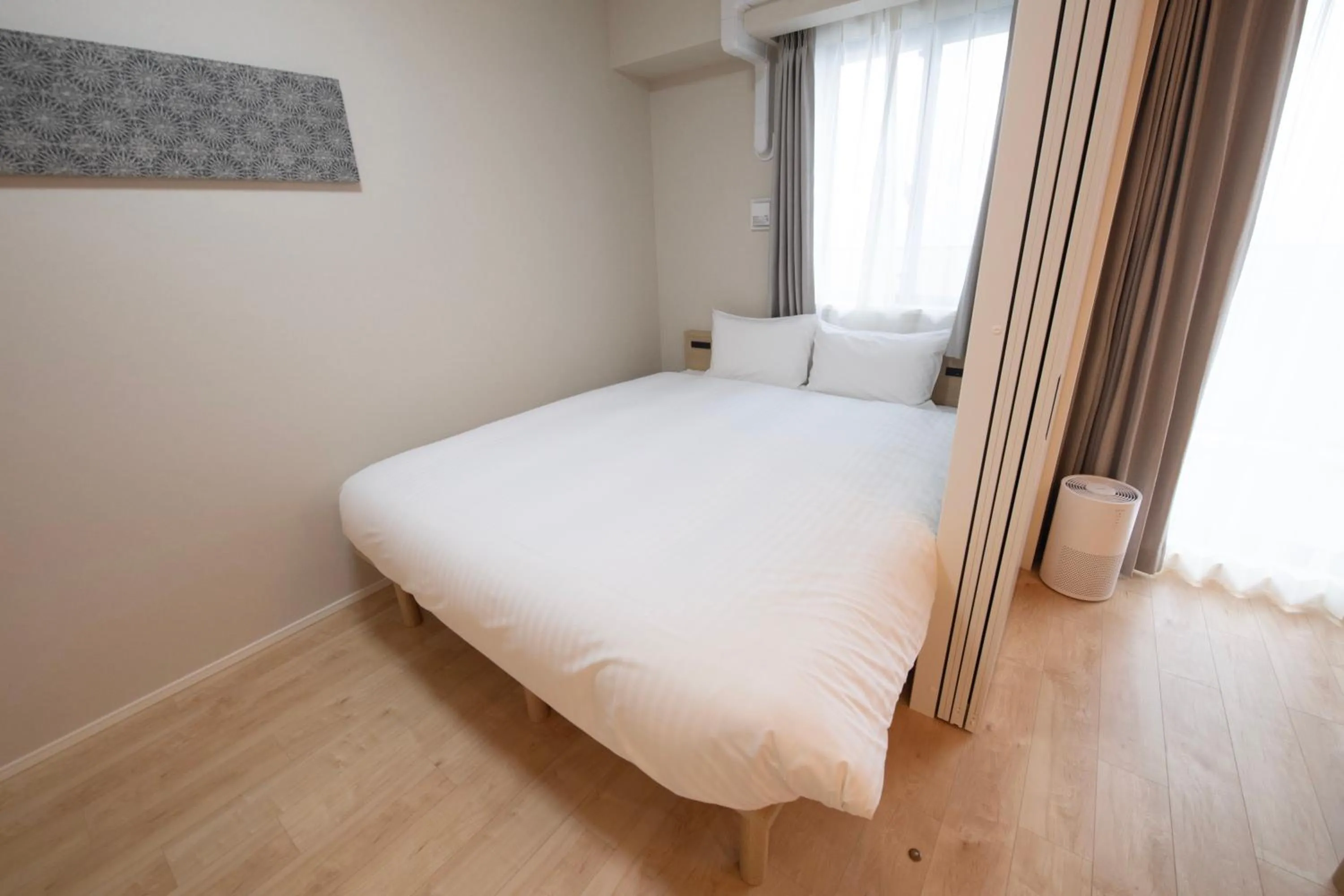 Bed in THE RISE Osaka Universal Bayside