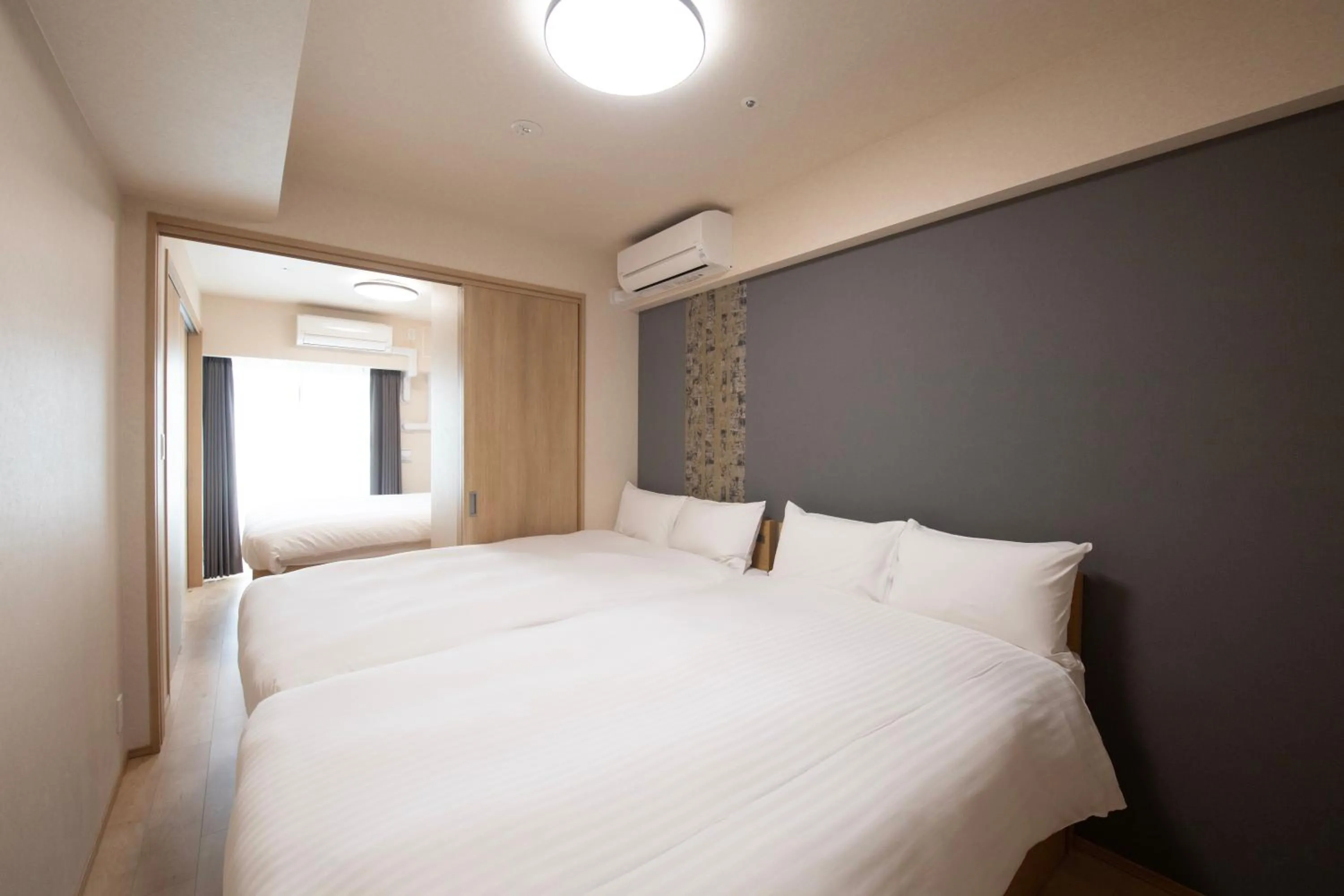 Bed in THE RISE Osaka Universal Bayside