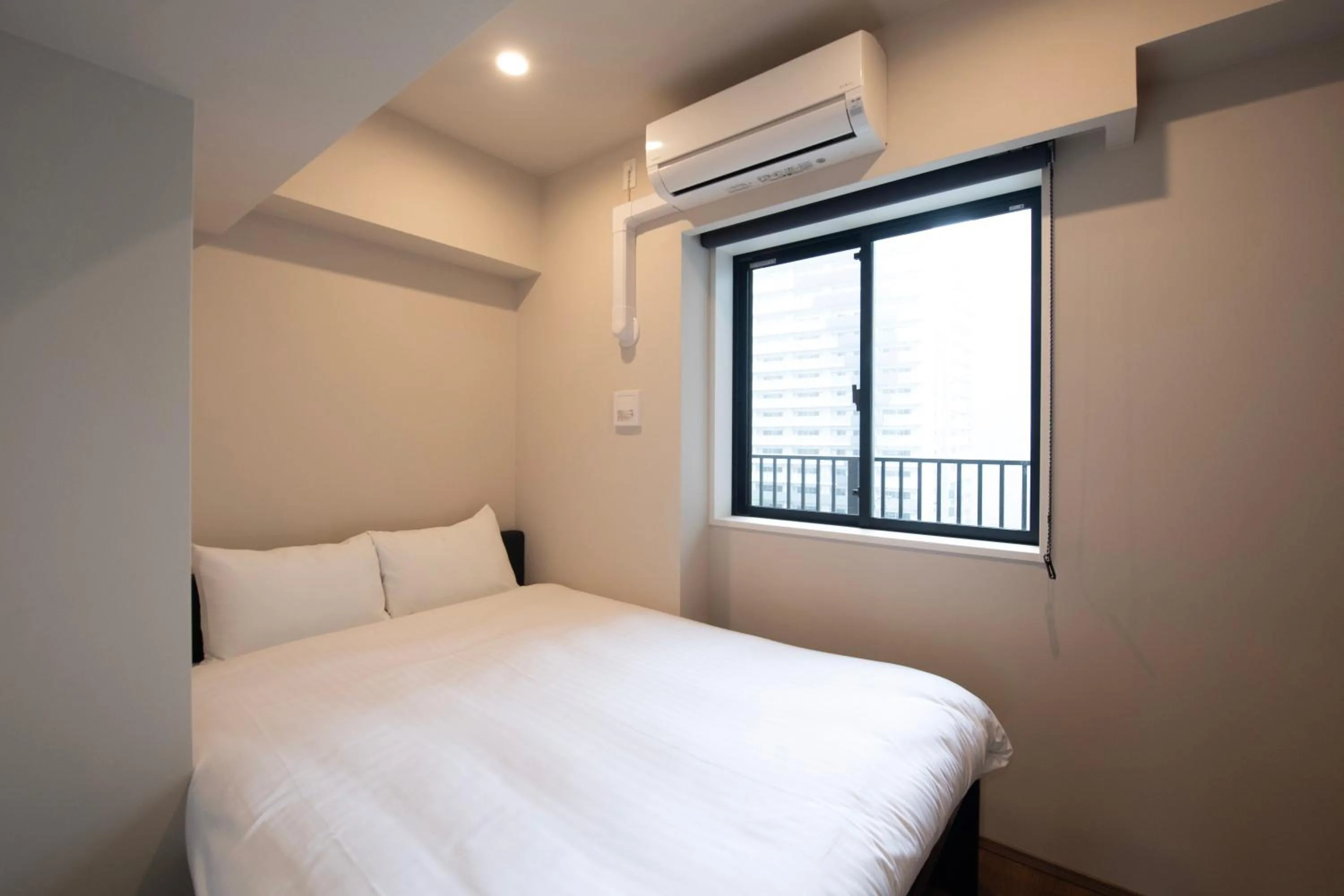 Bed in THE RISE Osaka Universal Bayside