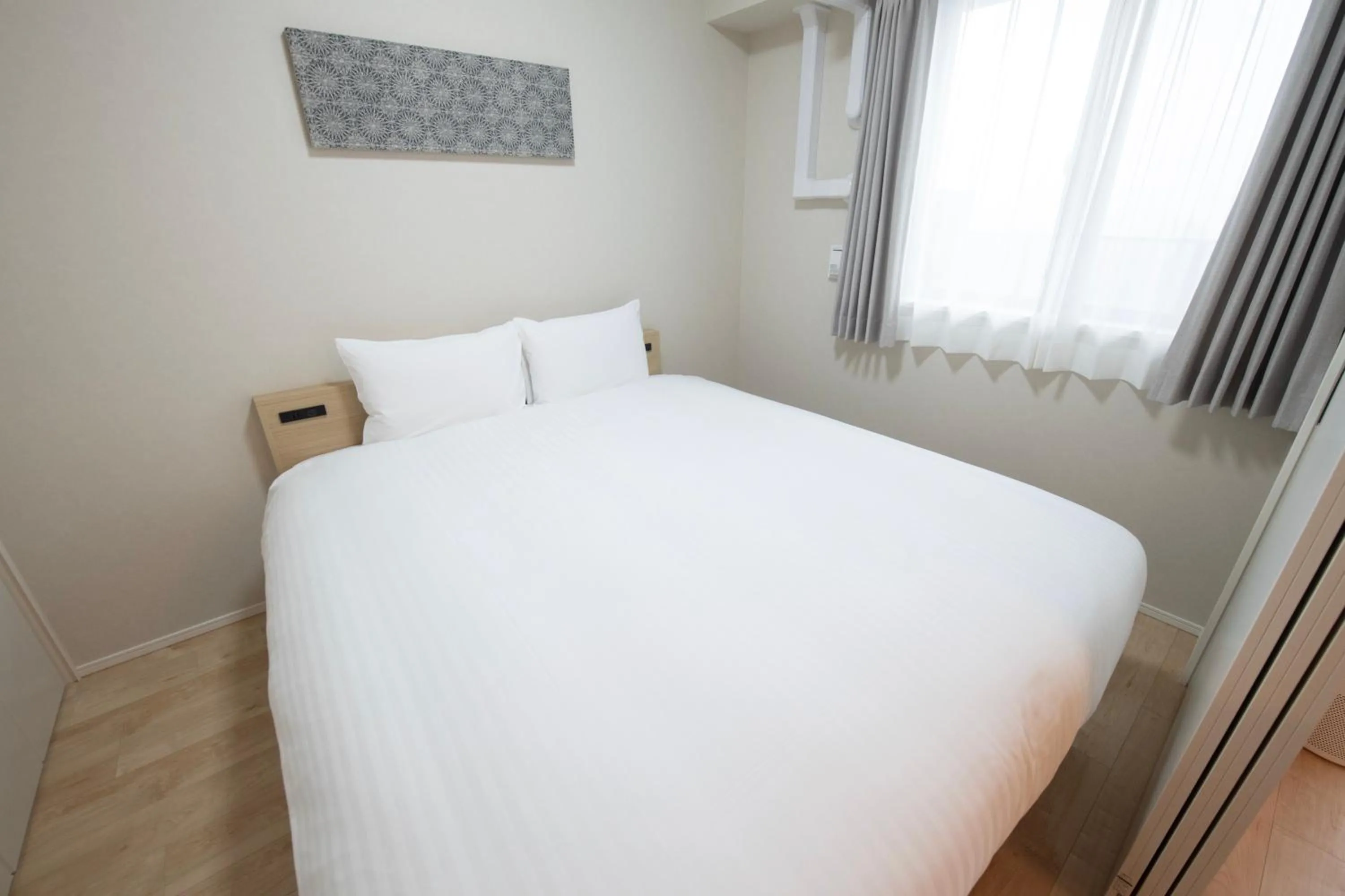 Bed in THE RISE Osaka Universal Bayside
