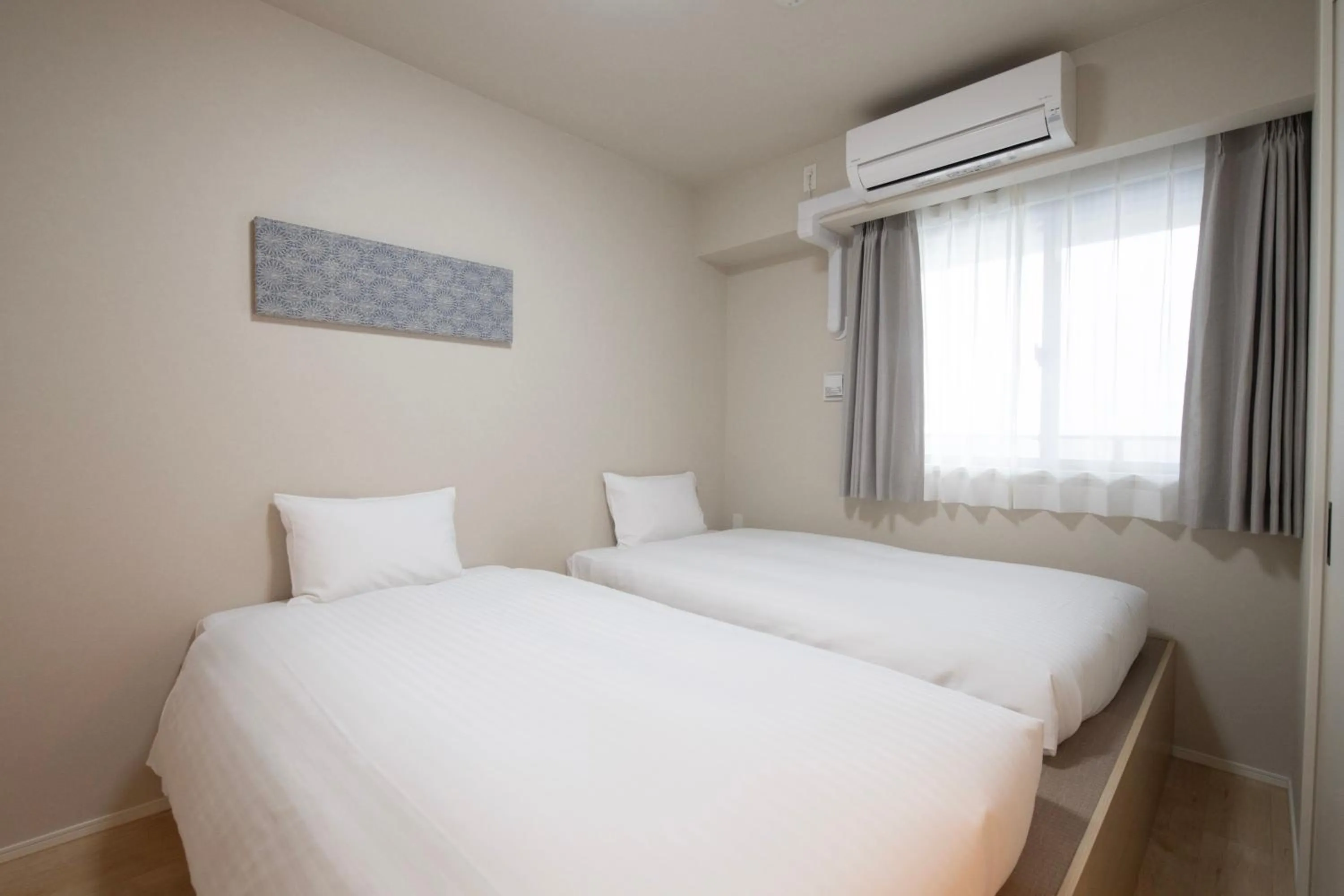 Bed in THE RISE Osaka Universal Bayside