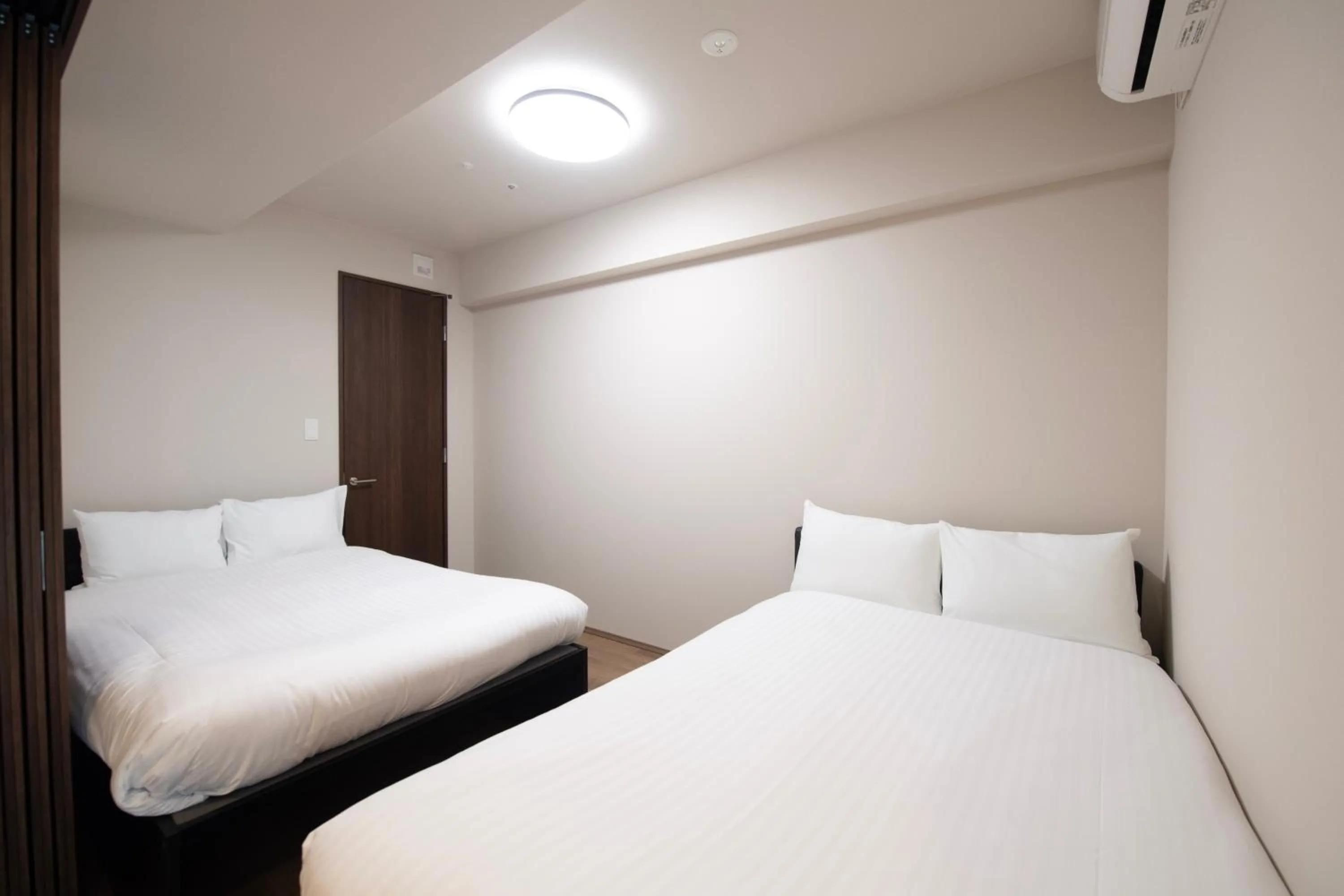Bed in THE RISE Osaka Universal Bayside
