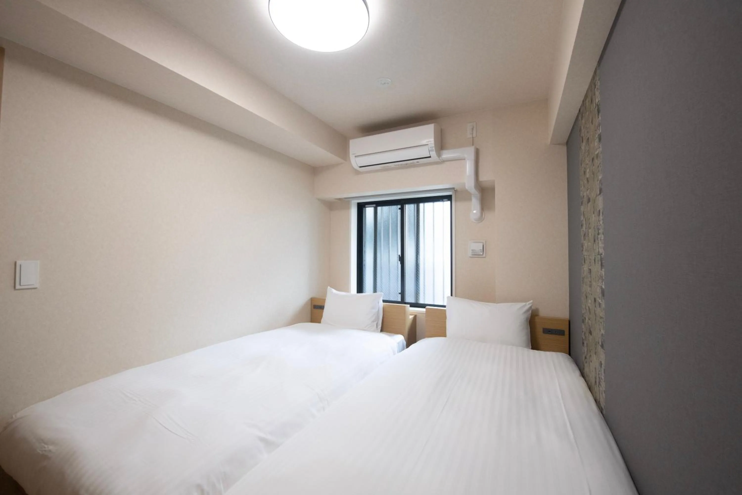 Bed in THE RISE Osaka Universal Bayside