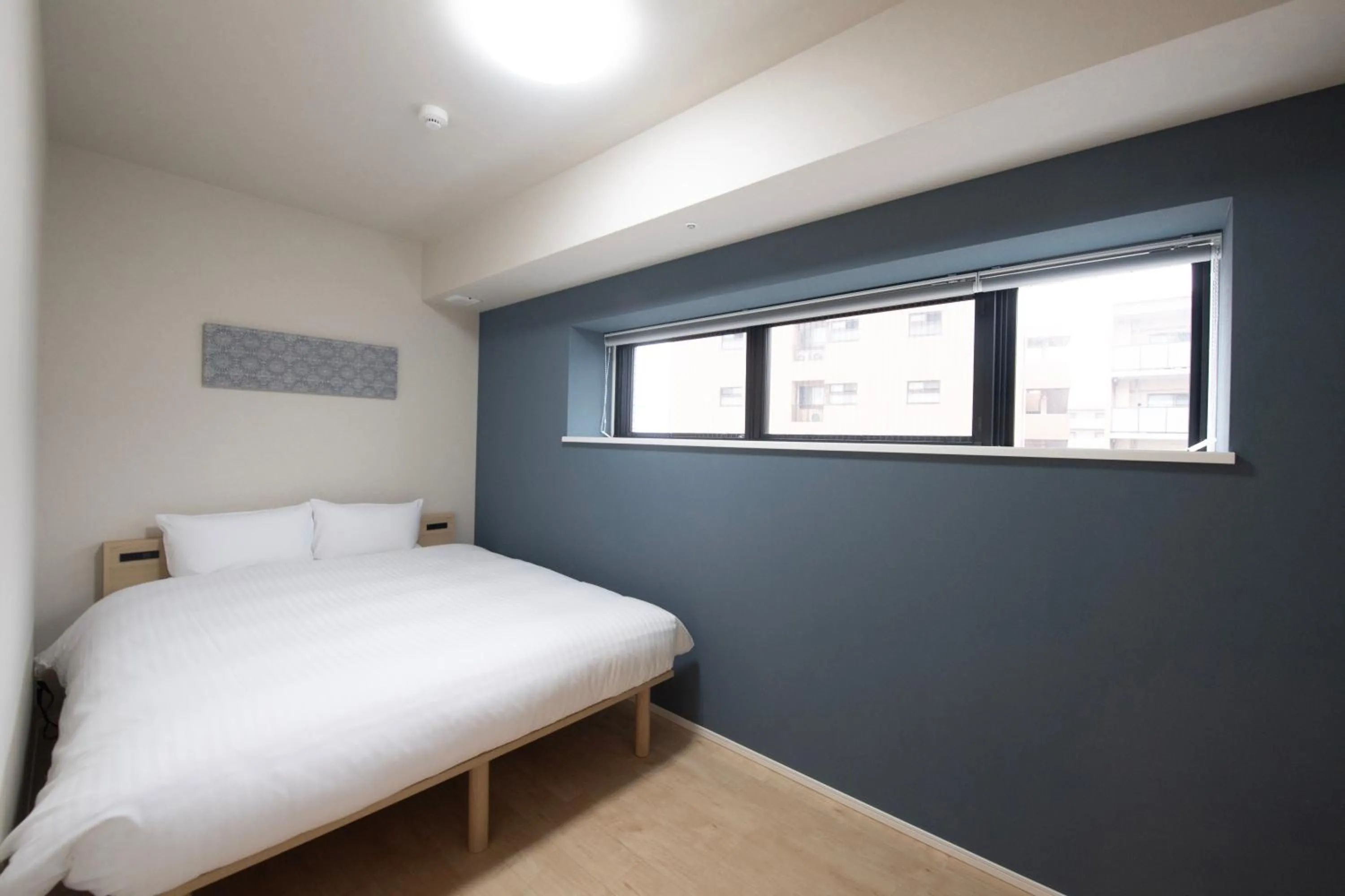Bed in THE RISE Osaka Universal Bayside