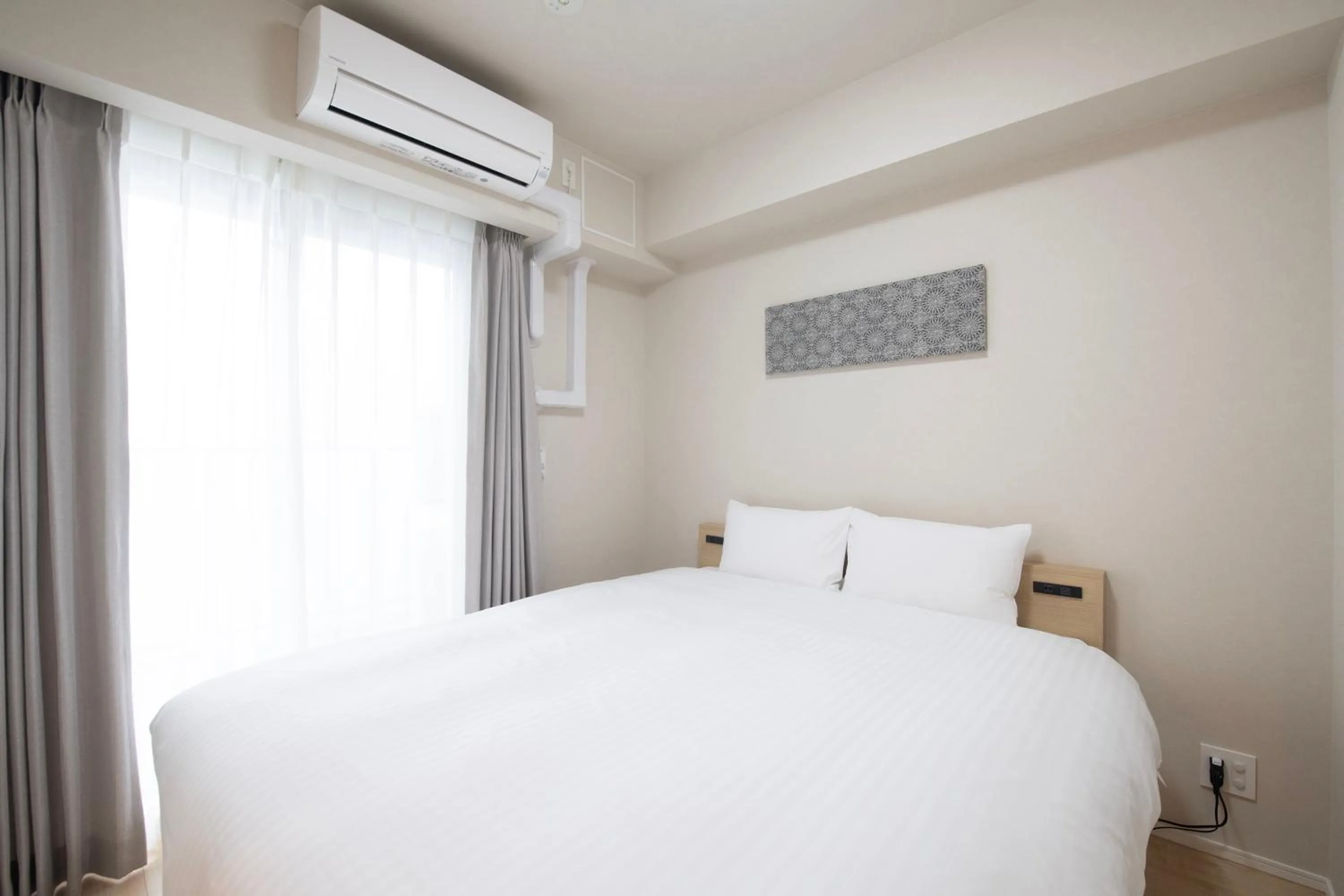 Bed in THE RISE Osaka Universal Bayside