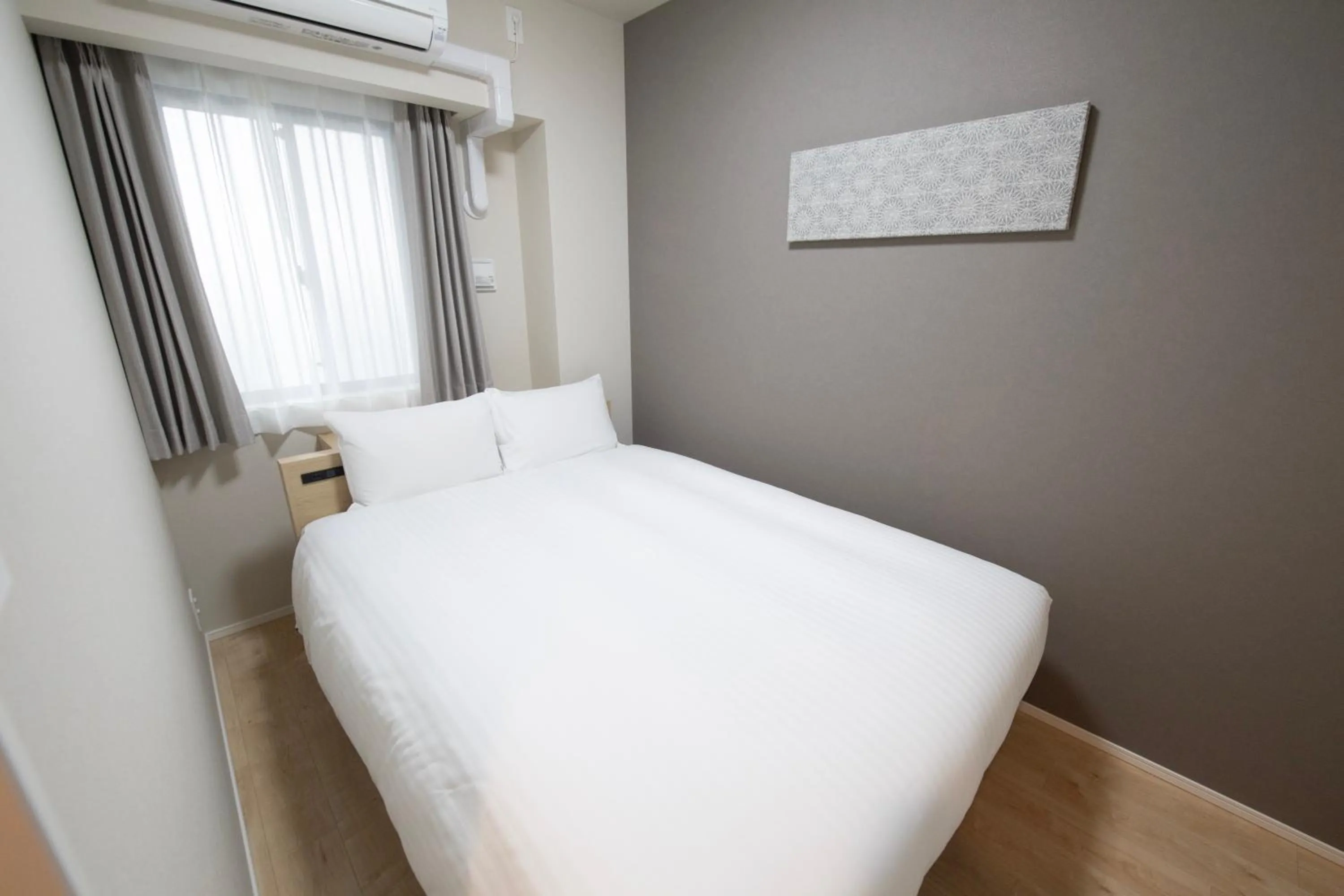 Bed in THE RISE Osaka Universal Bayside