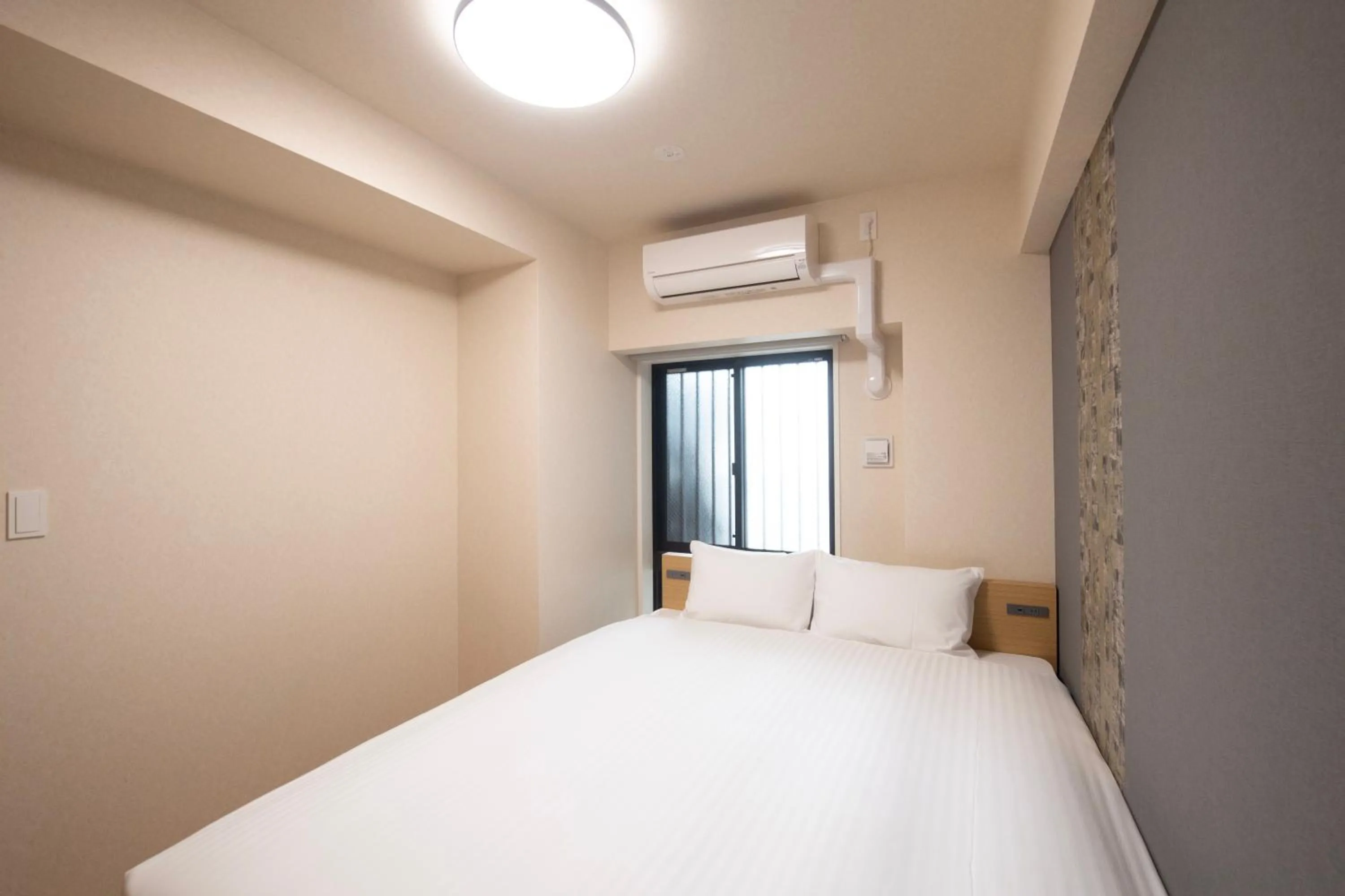 Bed in THE RISE Osaka Universal Bayside