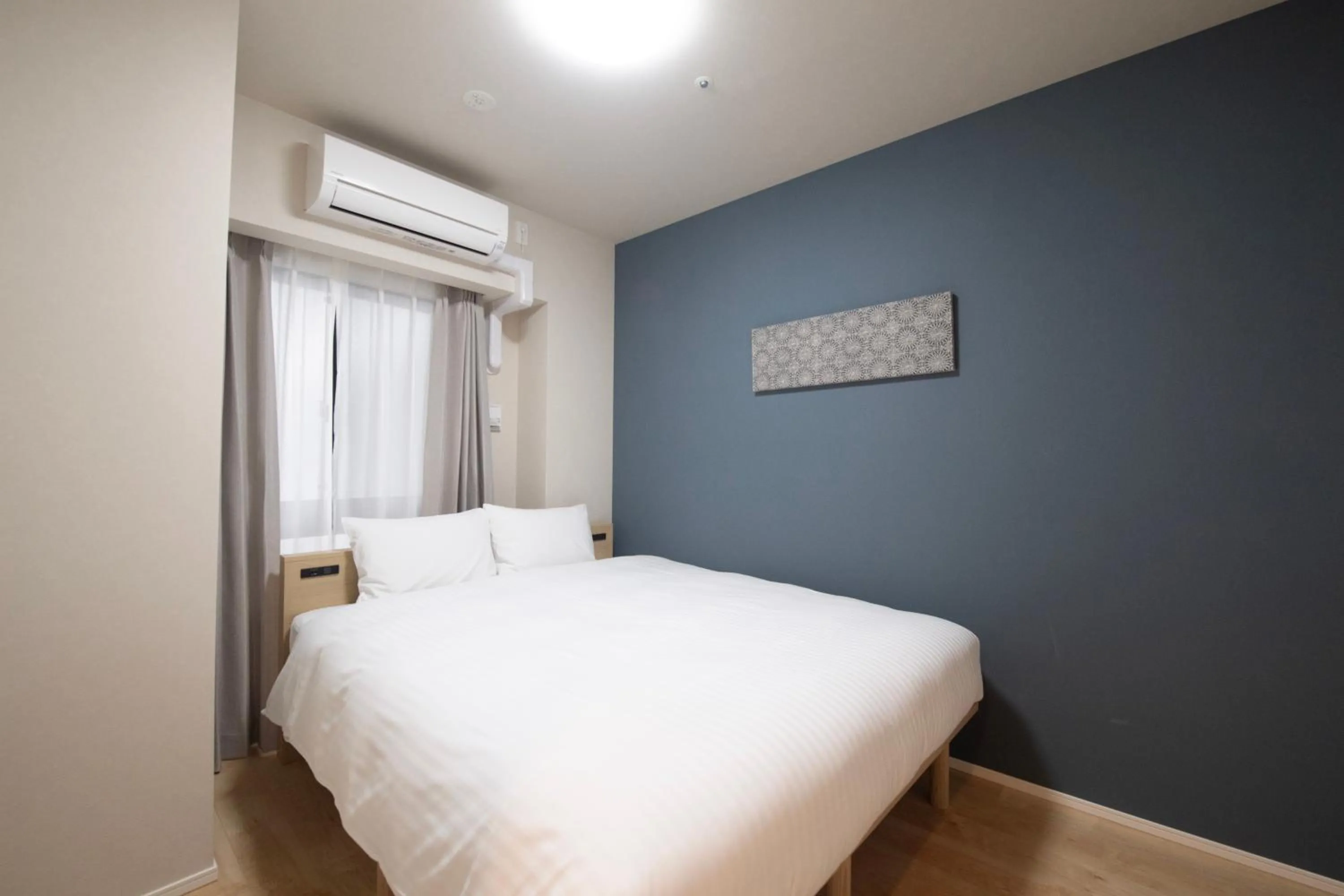 Bed in THE RISE Osaka Universal Bayside