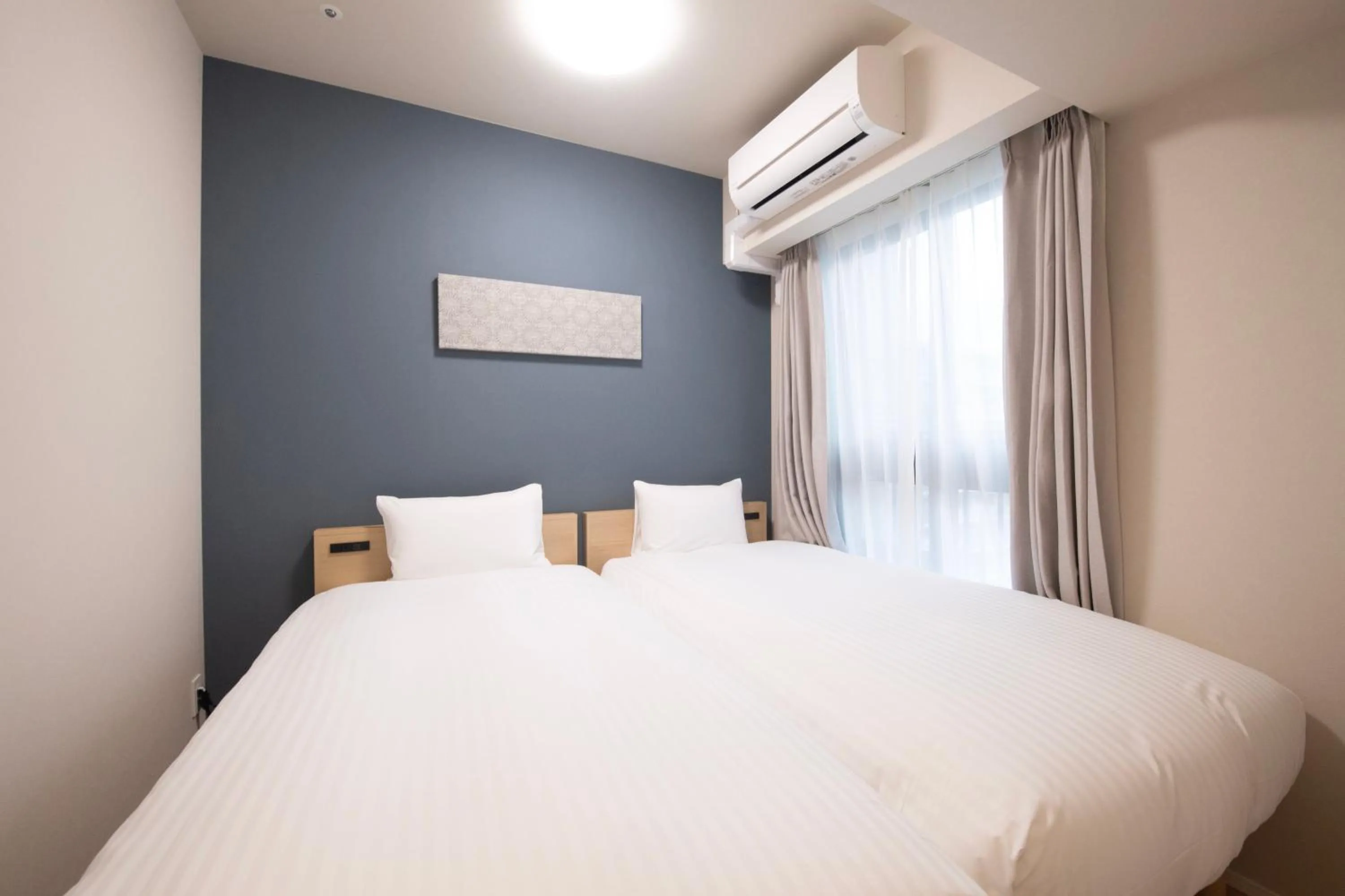 Bed in THE RISE Osaka Universal Bayside