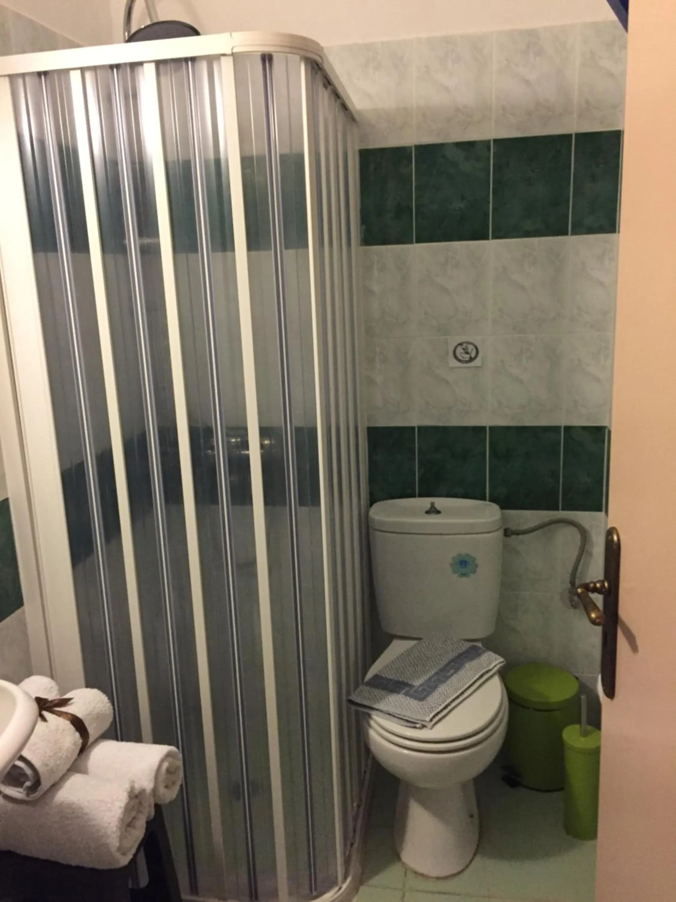 Bathroom in Anastasia Studios, Apartments & Suites