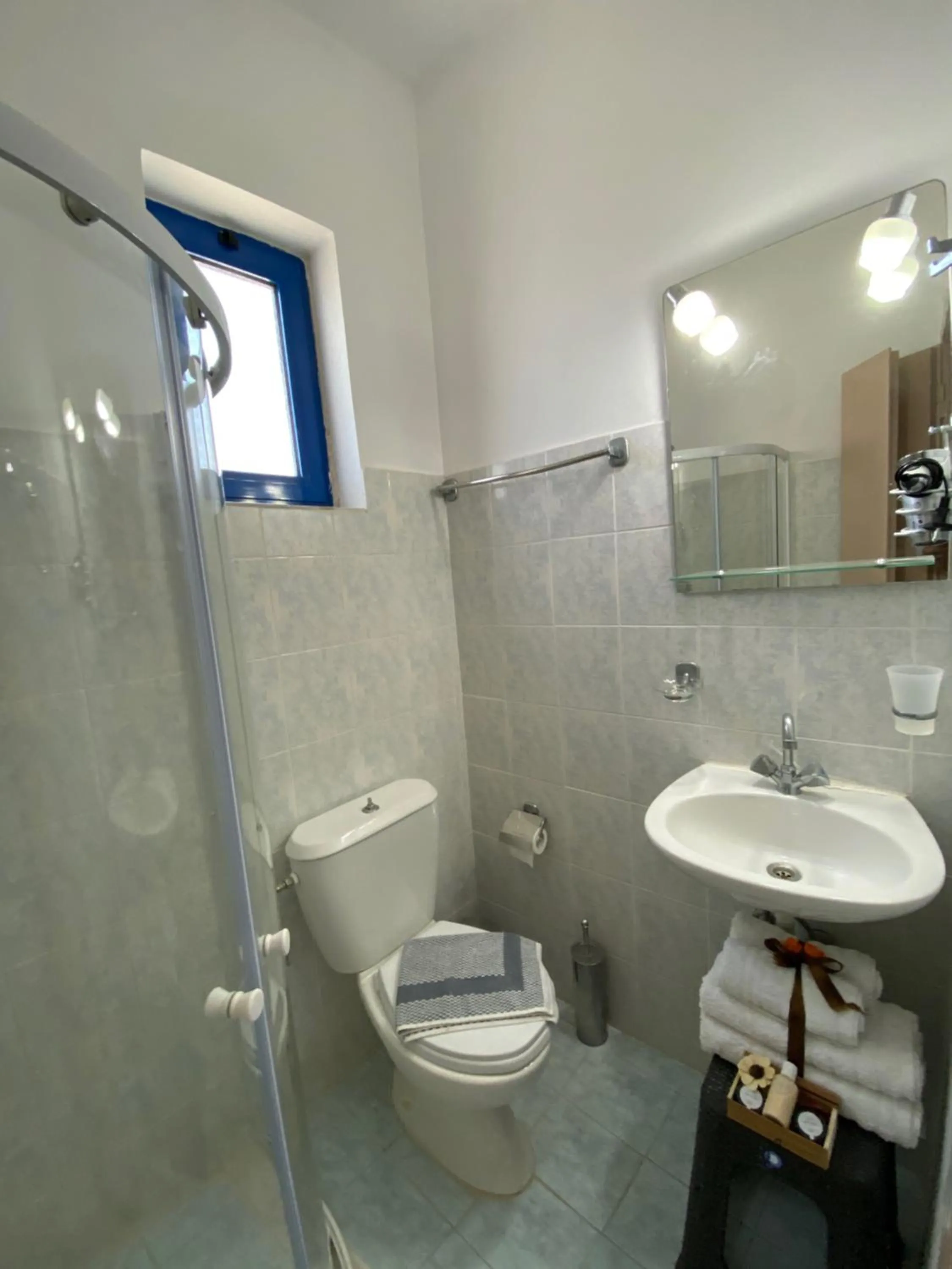 Shower in Anastasia Studios, Apartments & Suites