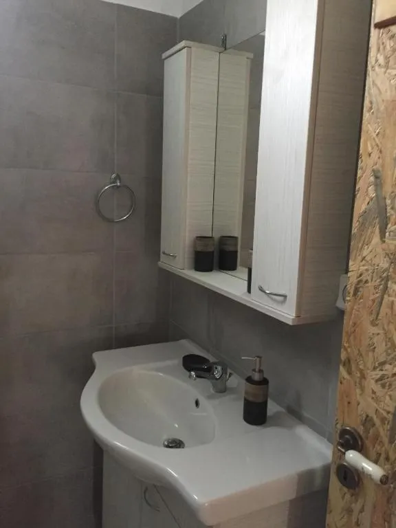 Toilet in Anastasia Studios, Apartments & Suites