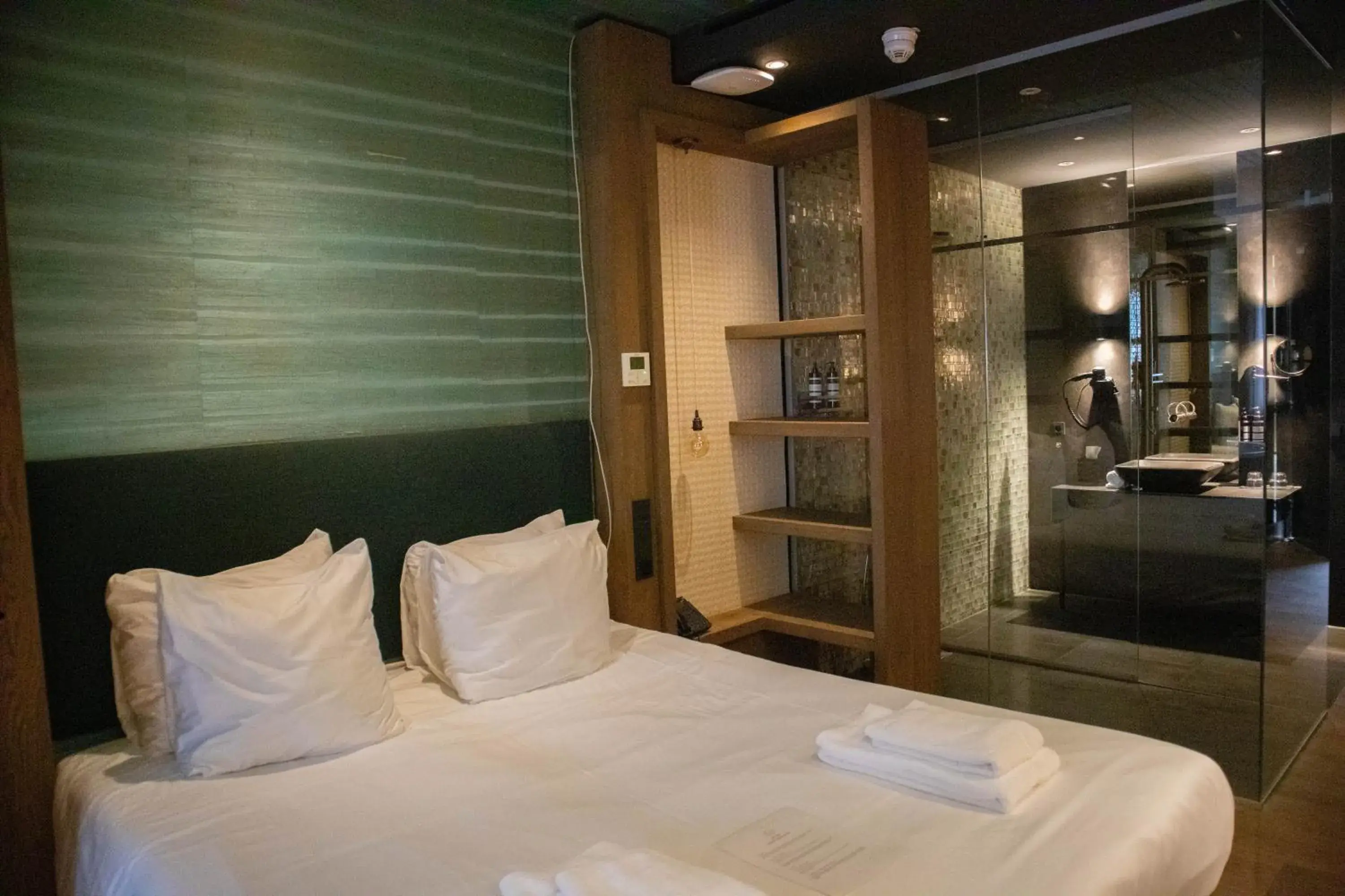 Bed in Manzo's Suites Bed in Manzo's Suites