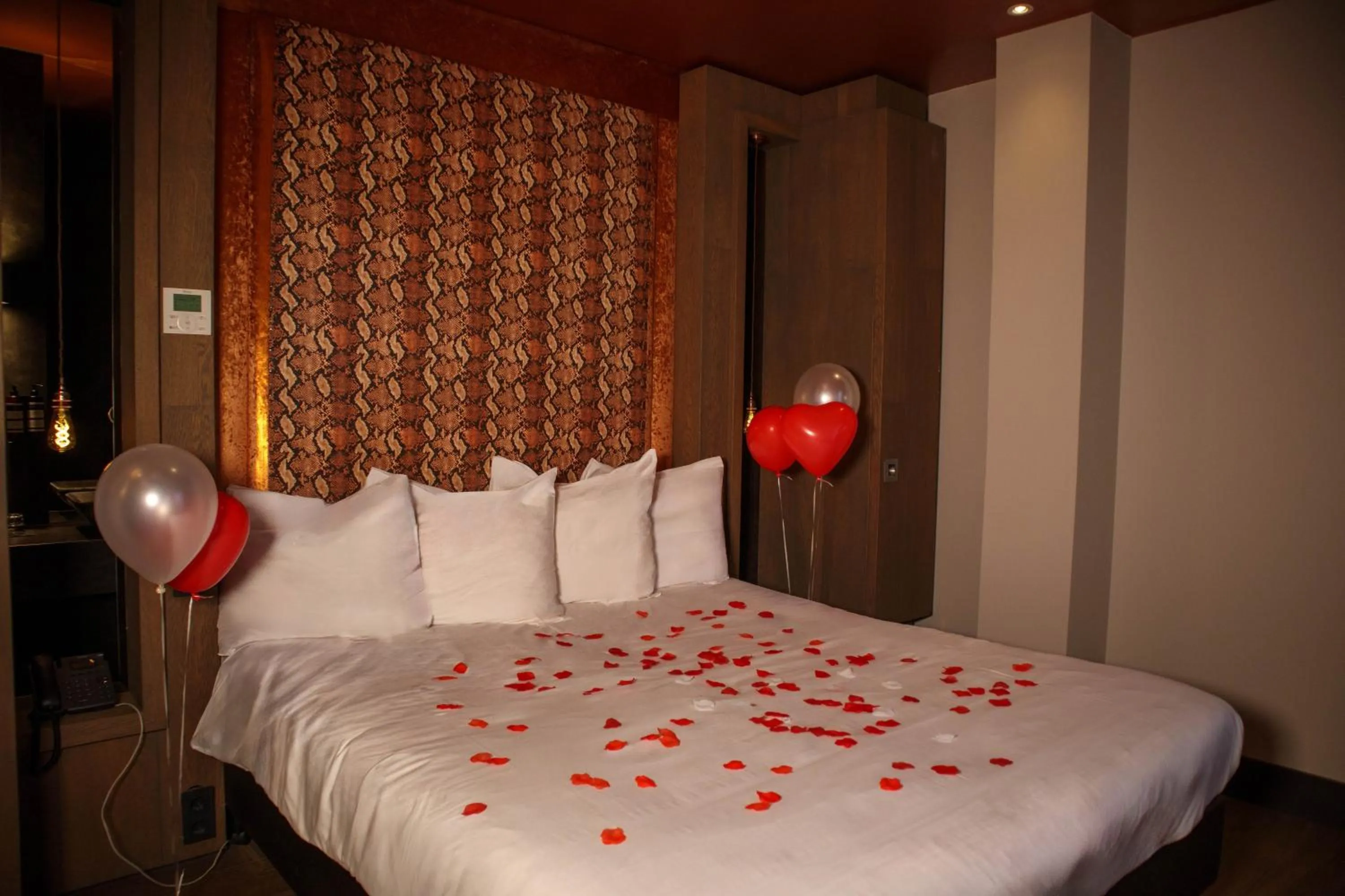 Bed in Manzo's Suites