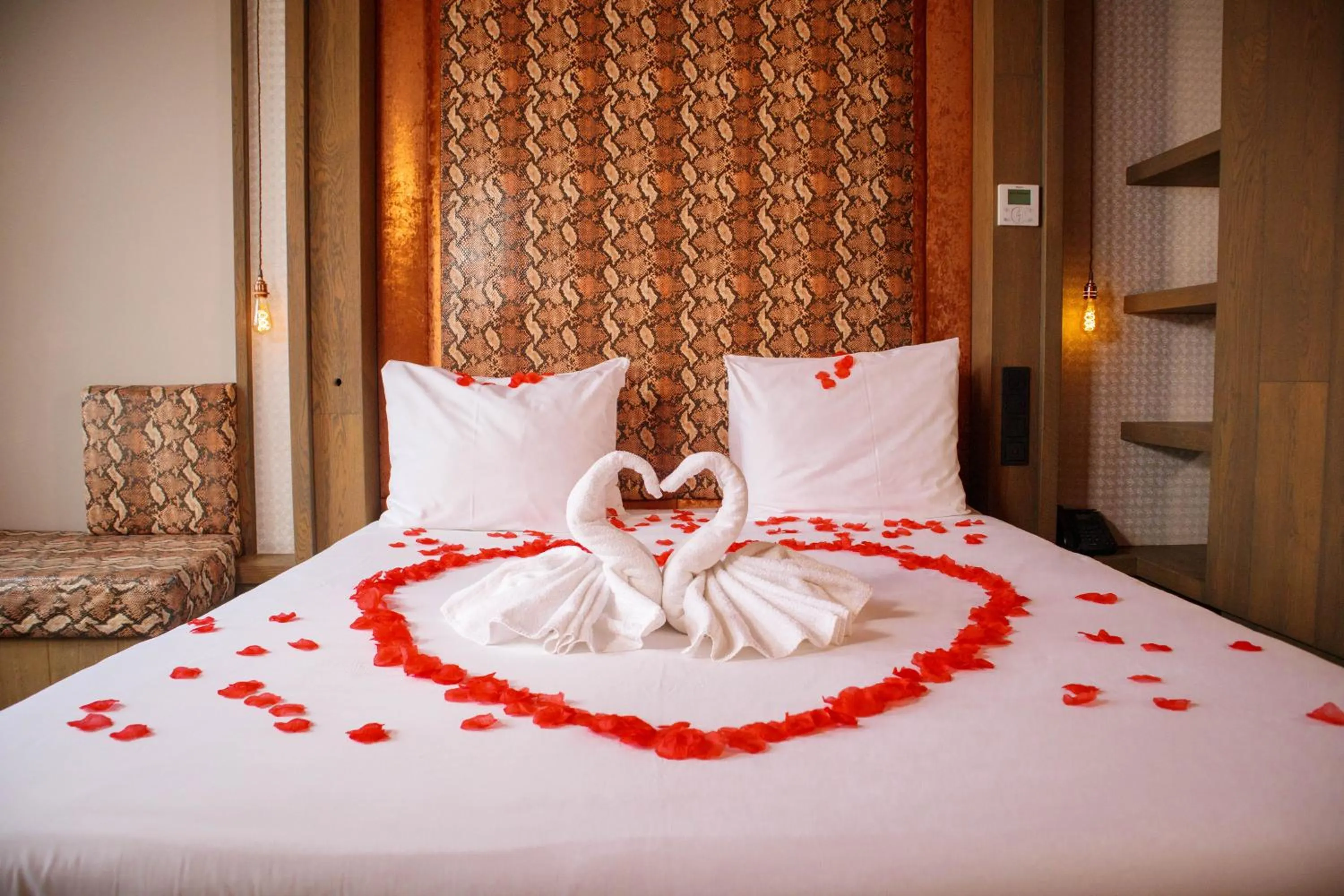 Bed in Manzo's Suites