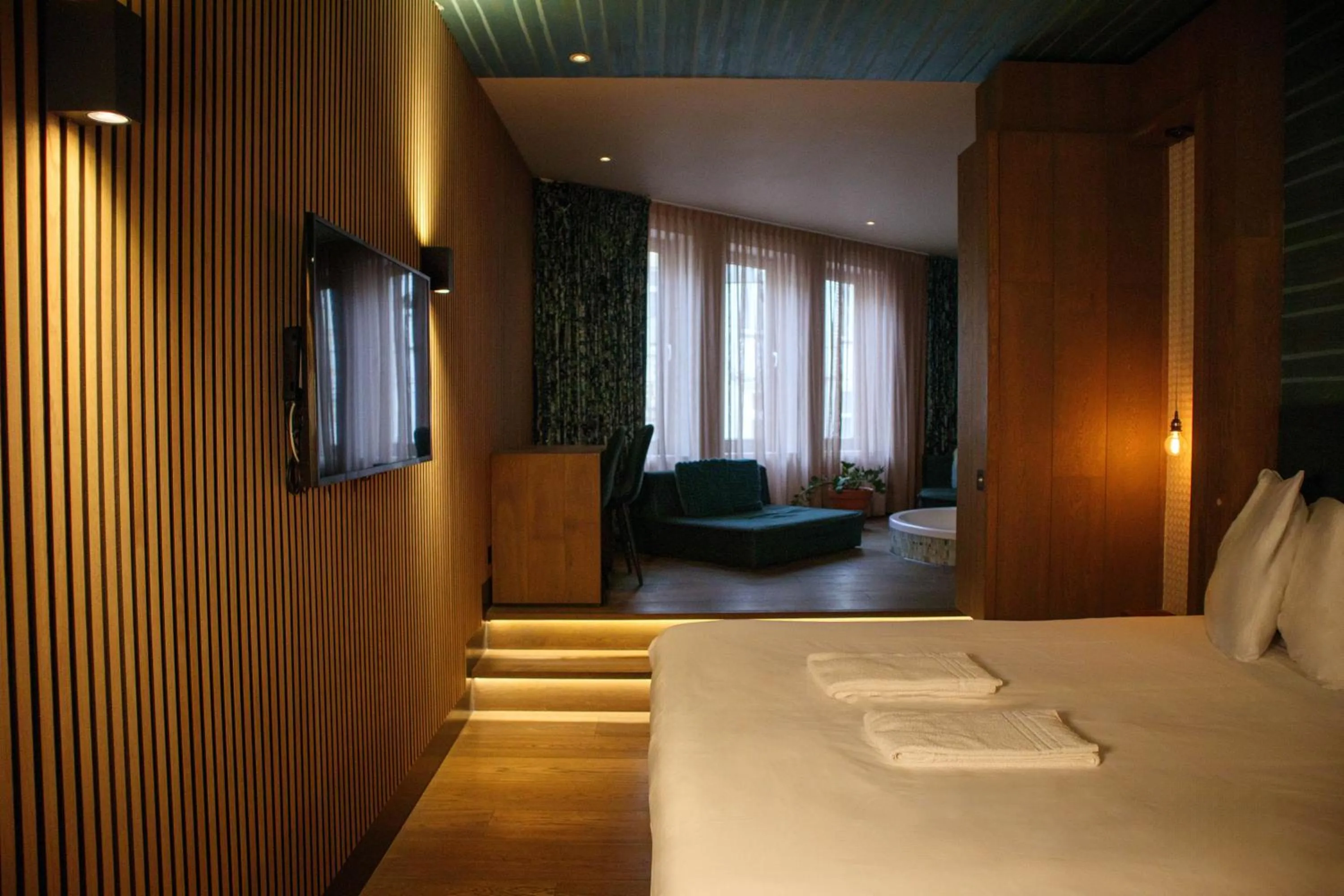 Bed in Manzo's Suites