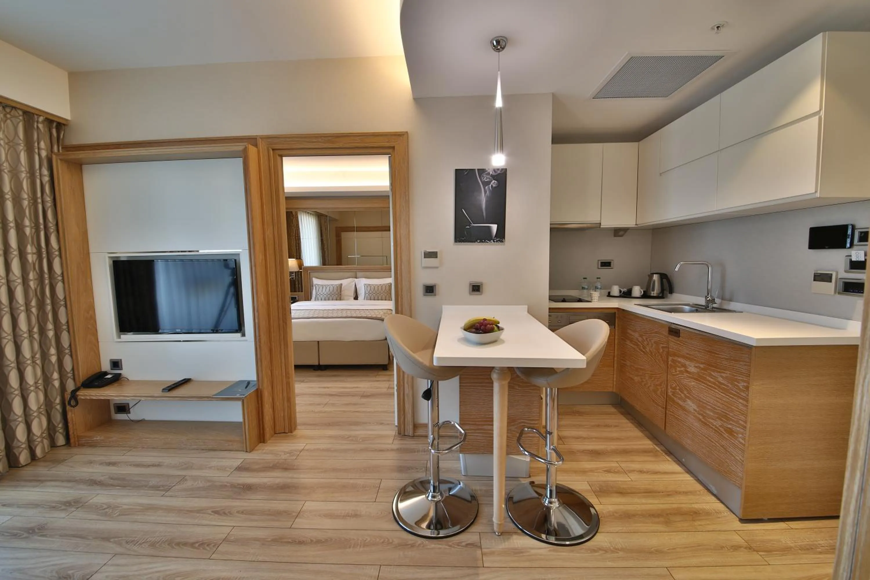 Kitchen or kitchenette, Bed in Bof Hotels Ceo Suites Atasehir