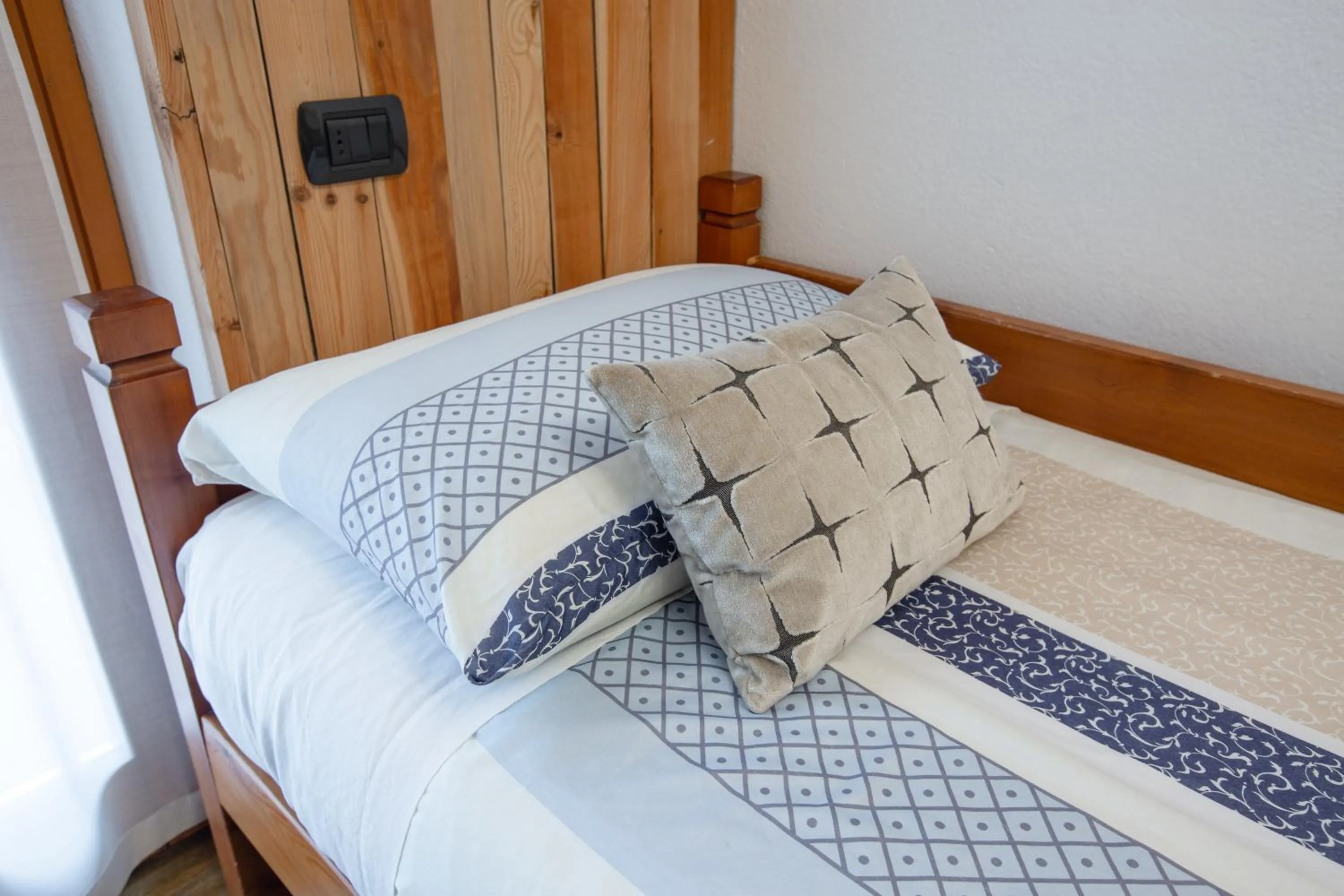 Bed in Hotel Biancospino