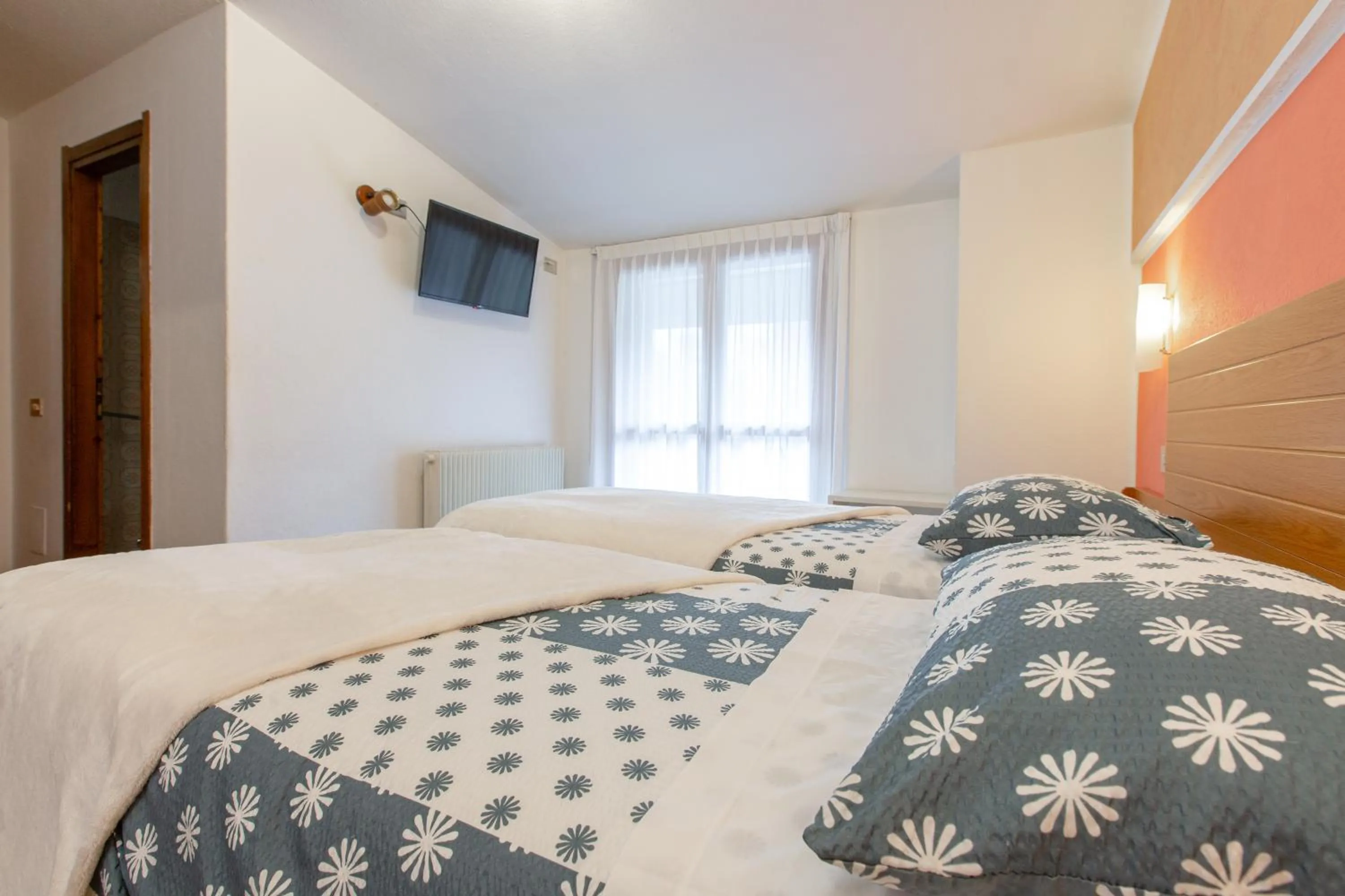 Bed in Hotel Biancospino